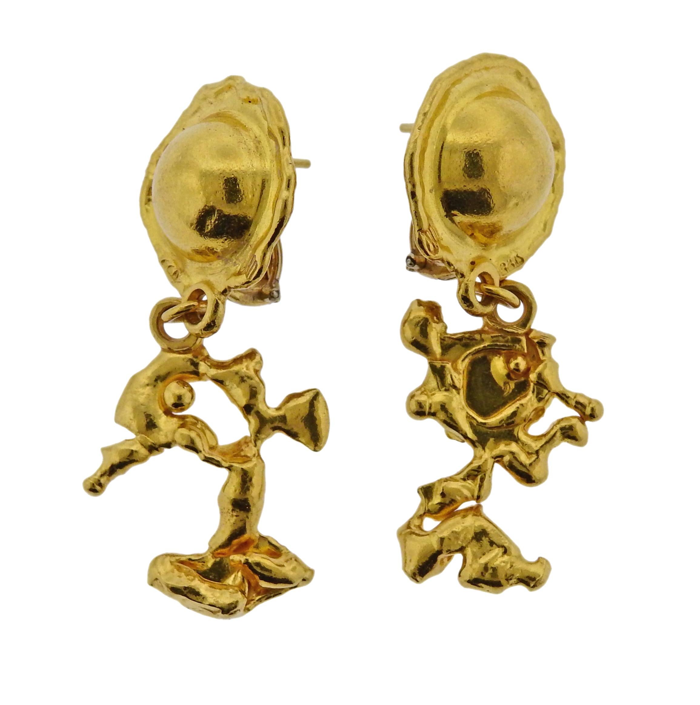 Pair of 22k gold Charming Creatures earrings, crafted by Jean Mahie. Earrings are 53mm x 24mm, weigh 25.9 grams. Marked:  M hallmark, 22k.