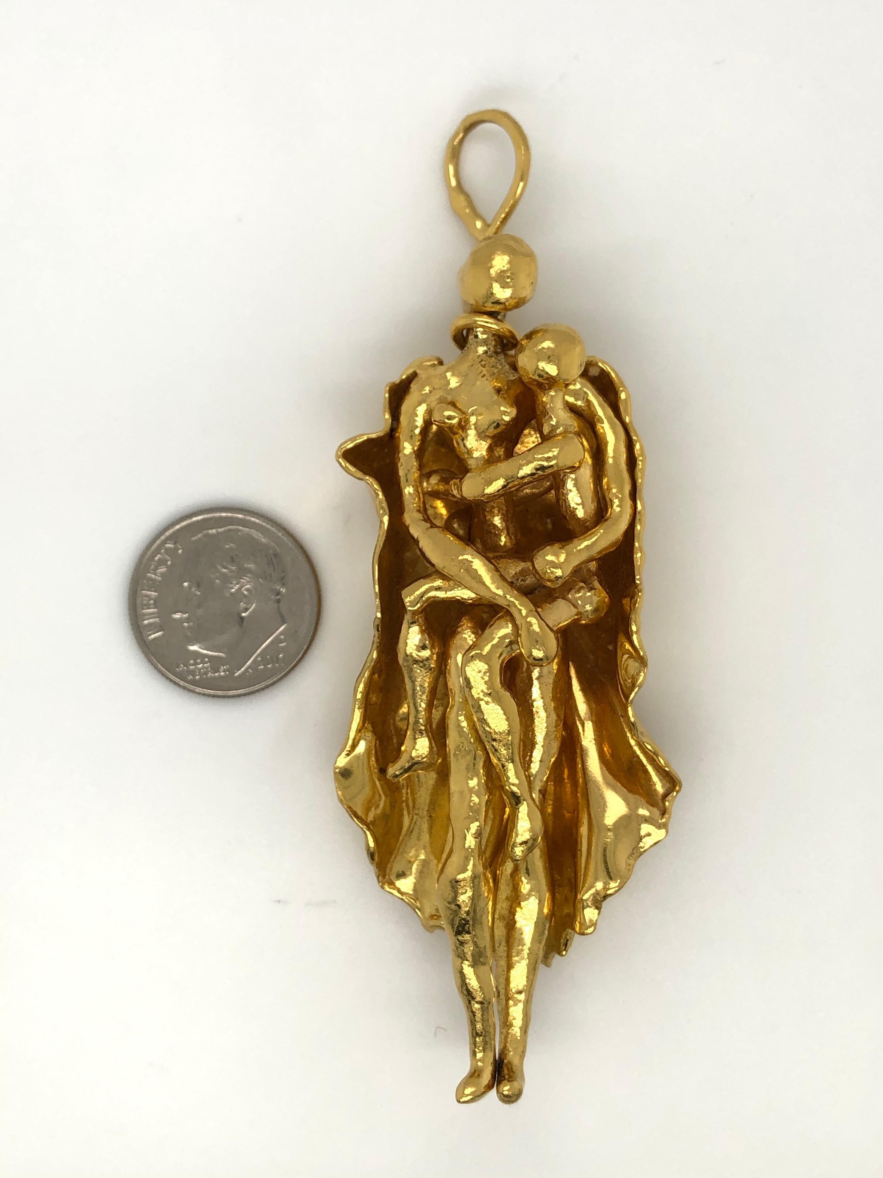 Jean Mahie Mother and Child Pendant in 22k gold. Stamped 22k JM. Chain in picture not included.