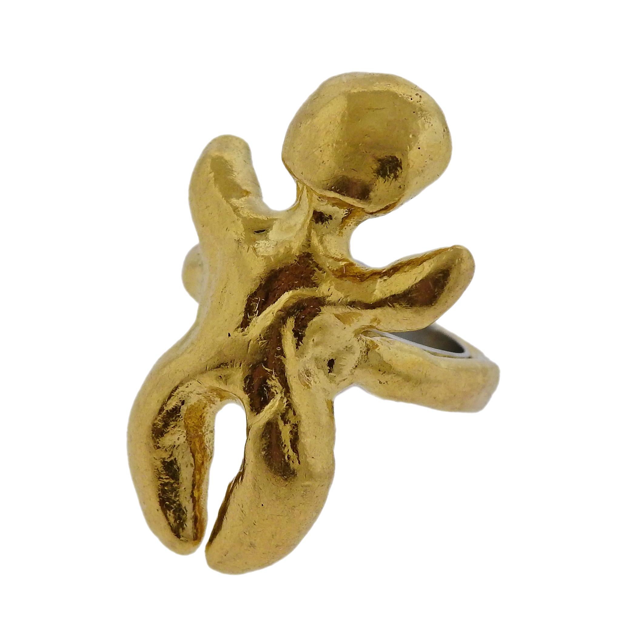 22k gold figural ring, designed by Jean Mahie. Ring size 3, ring top is 30mm x 20mm, weighs 23.1 grams. Marked: M signature.