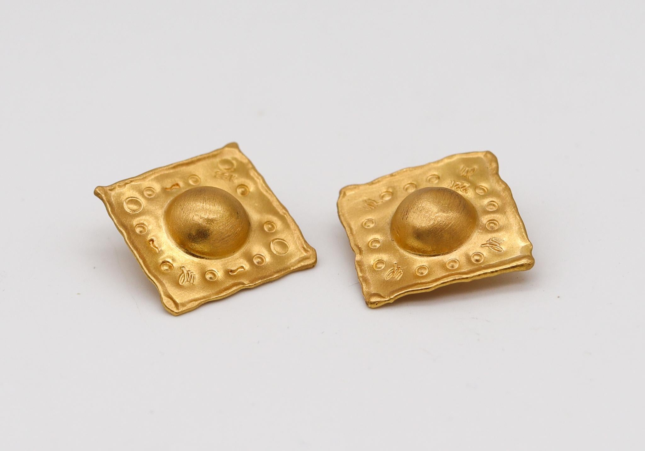 Textured earrings designed by Jean Mahie.

A beautiful pieces of art, created in Paris France by the artist and goldsmith Jean Mahie, back in the late 1980's. These pair of sculptural ear-clips earrings has been crafted in solid rich yellow gold of