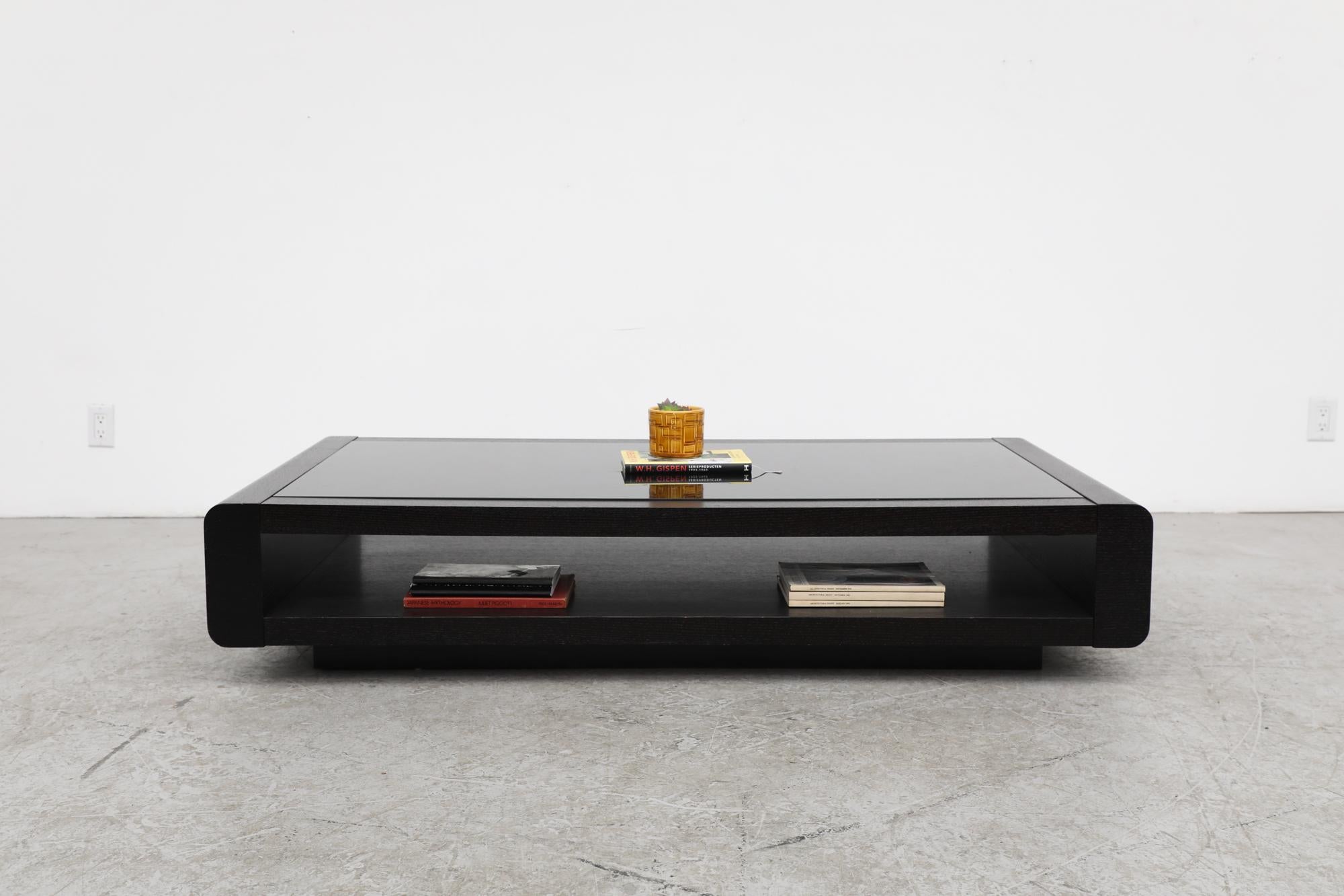 Mid-Century Modern Jean Maneval Style Low Black Glass and Dark Wenge Coffee Table with Lower Shelf For Sale