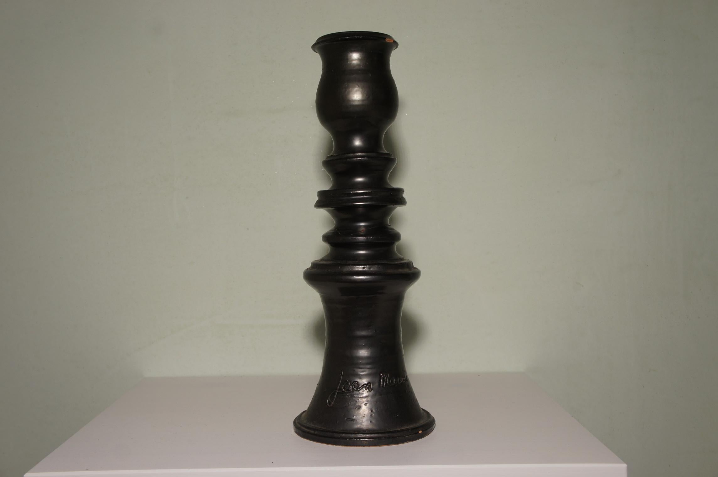 Candlestick by Jean Marais, early the 1950s
This work was done in Vallauris, where he collaborates with Jean Cocteau
The candle holder has a black enamel, it is sold with its original candle