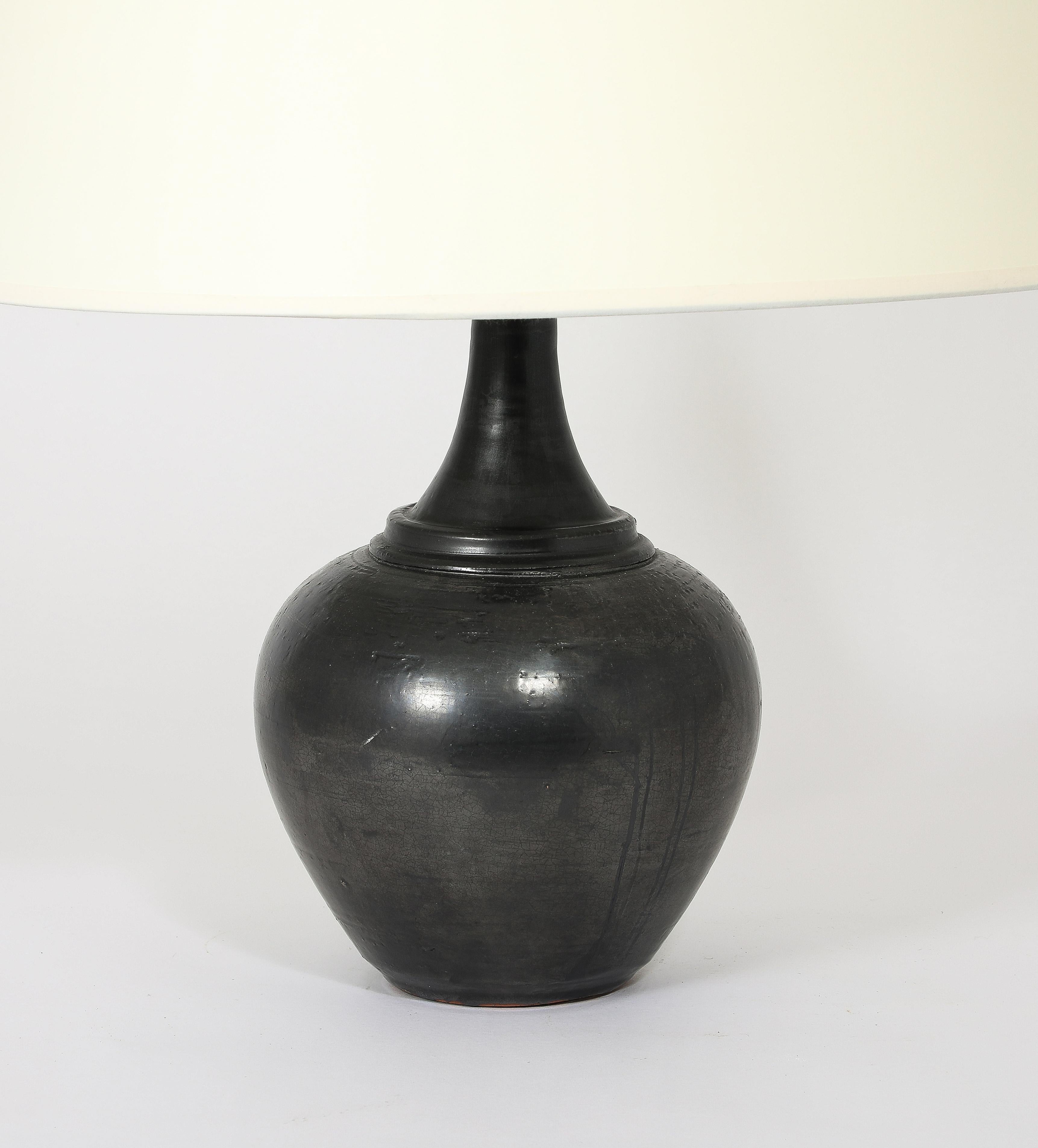 Large lamp by Jean Marais in gunmetal patina. Signed.

