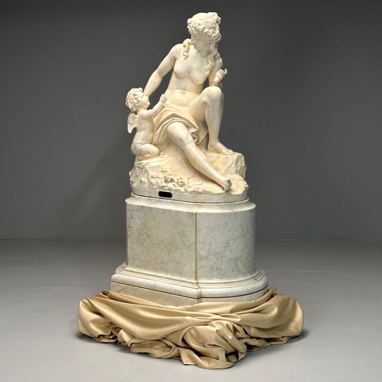 Jean-Marie Boucher, Venus and Cupid Marble Statue, White Marble, Romantic, c. 1910
 
Jean Boucher finely detailed marble sculpture on an impressive marble pedestal base. Plaque on base inscribed: VENUS AND CUPID / JEAN-MARIE BOUCHER
 
Sculpture 39