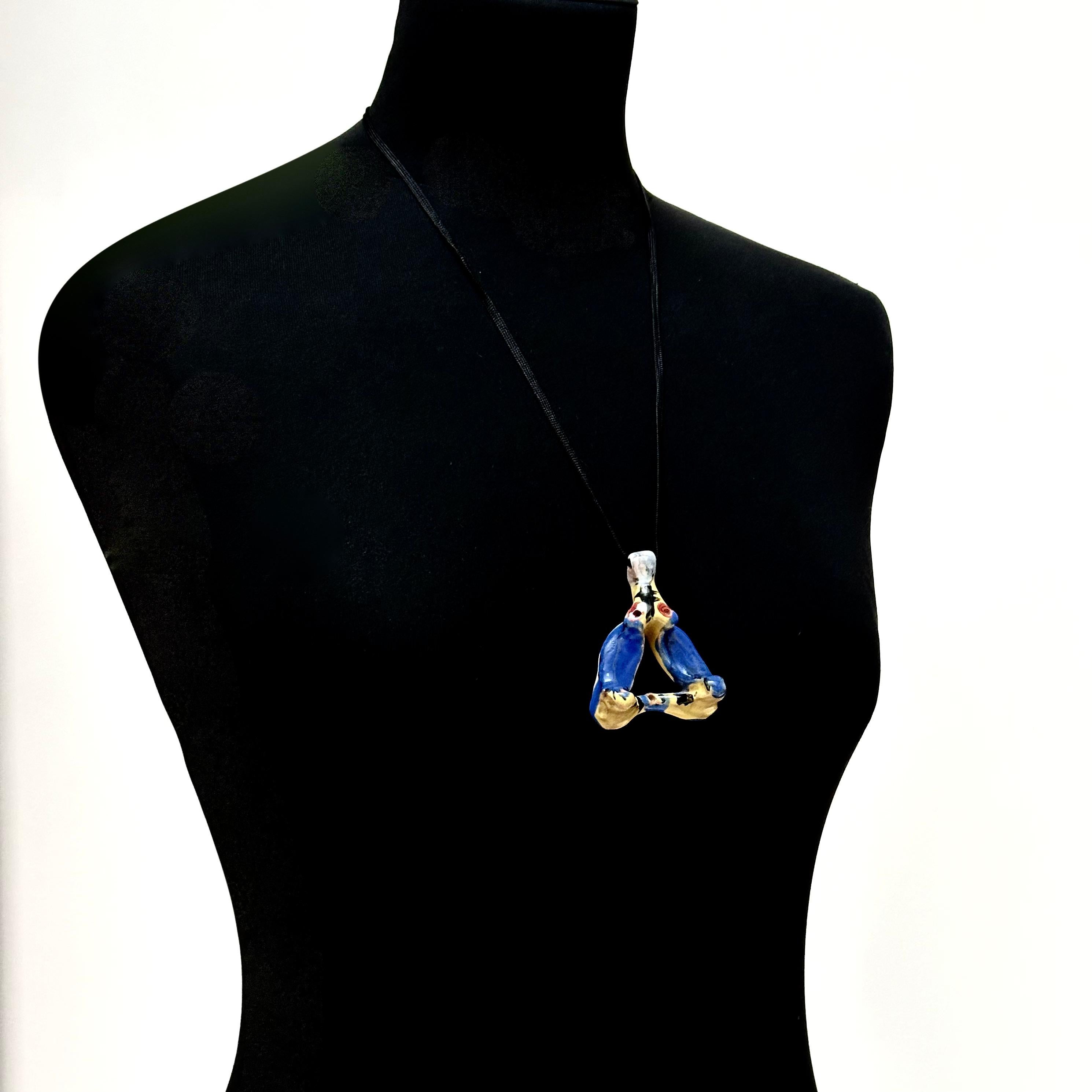 Extremly rare three-dimensional ceramic medallion depicting a stylised female silhouette.

Rich glazes with a juxtaposition of vivid colours. 

Signed on back.

The piece is in its original perfect condition.

About the Artist
Jean Megard