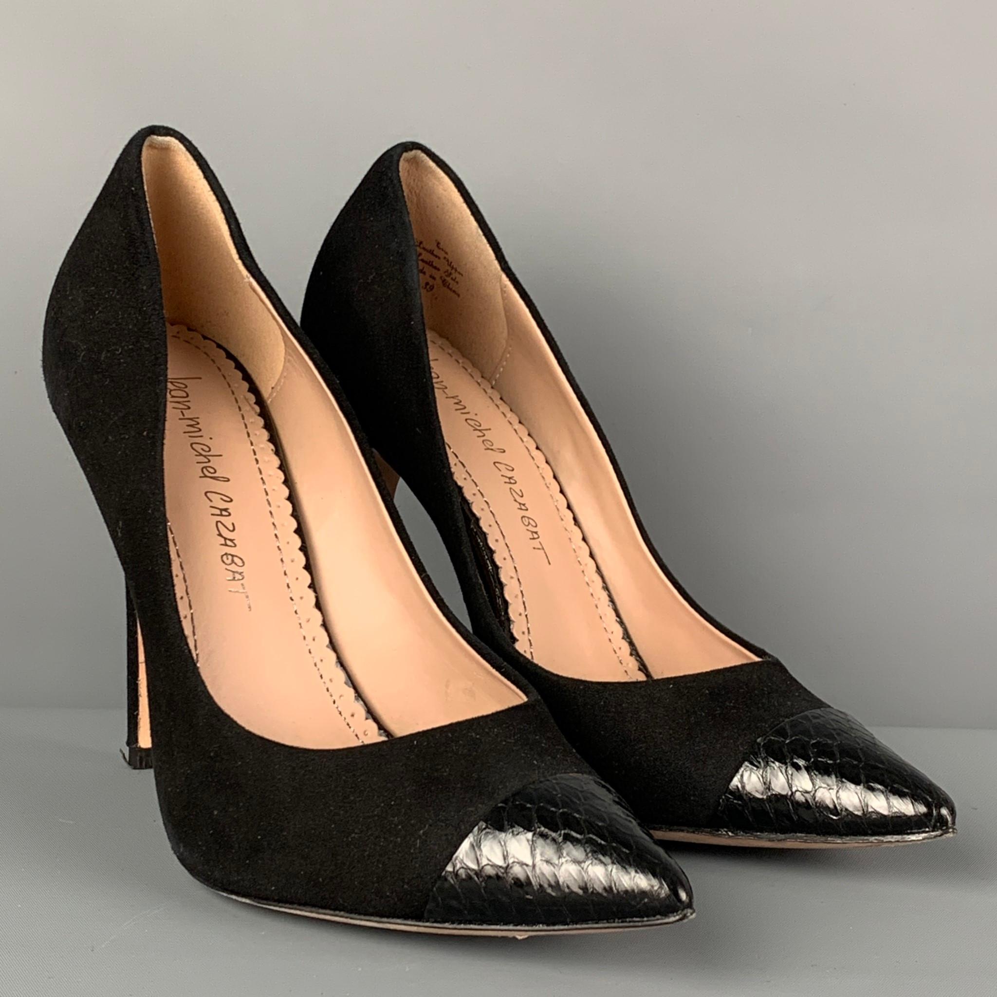 JEAN-MICHEL CAZABAT pumps comes in a black suede with a lizard trim featuring a pointed toe and a stiletto heel. Includes box.

Very Good Pre-Owned Condition.
Marked: 39

Measurements:

Heel: 4.5 in. 