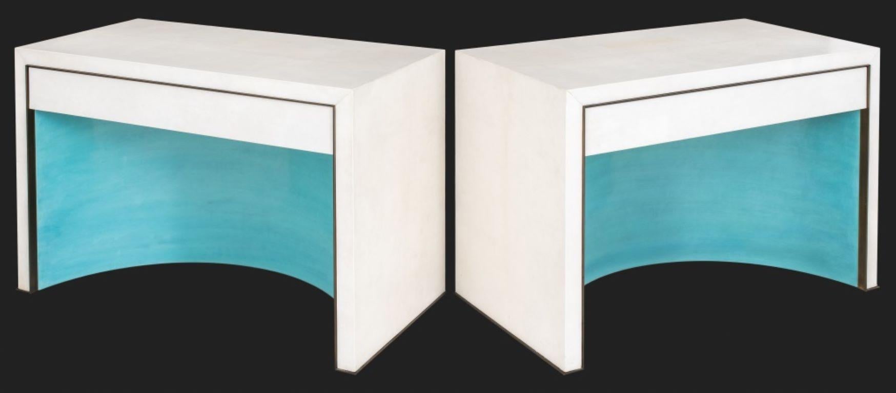 Pair of Jean-Michel Franck (French, 1895-1941) Style Art Deco Revival Leather Clad Side or End Tables with Finished Backs, each with brass encircling Tiffany Robin's Egg blue interior and one drawer.

Dealer: S138XX
