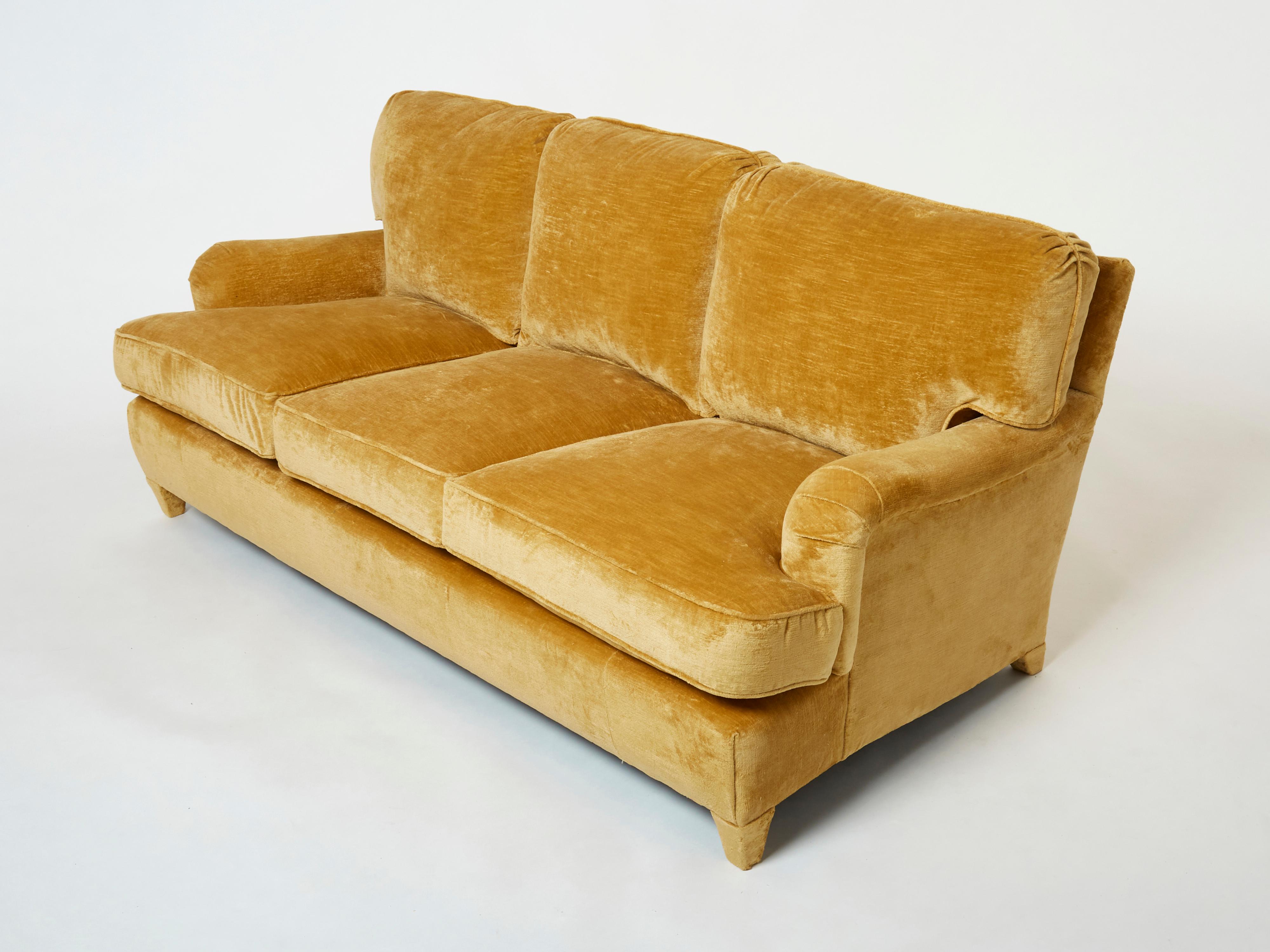 This beautiful sofa by Jean-Michel Frank, designed and produced in the mid 1930s, has been newly reupholstered with a mustard yellow linen velvet  fabric by Pierre Frey, reference Georges, made of cotton and linen. It has been fully restored,