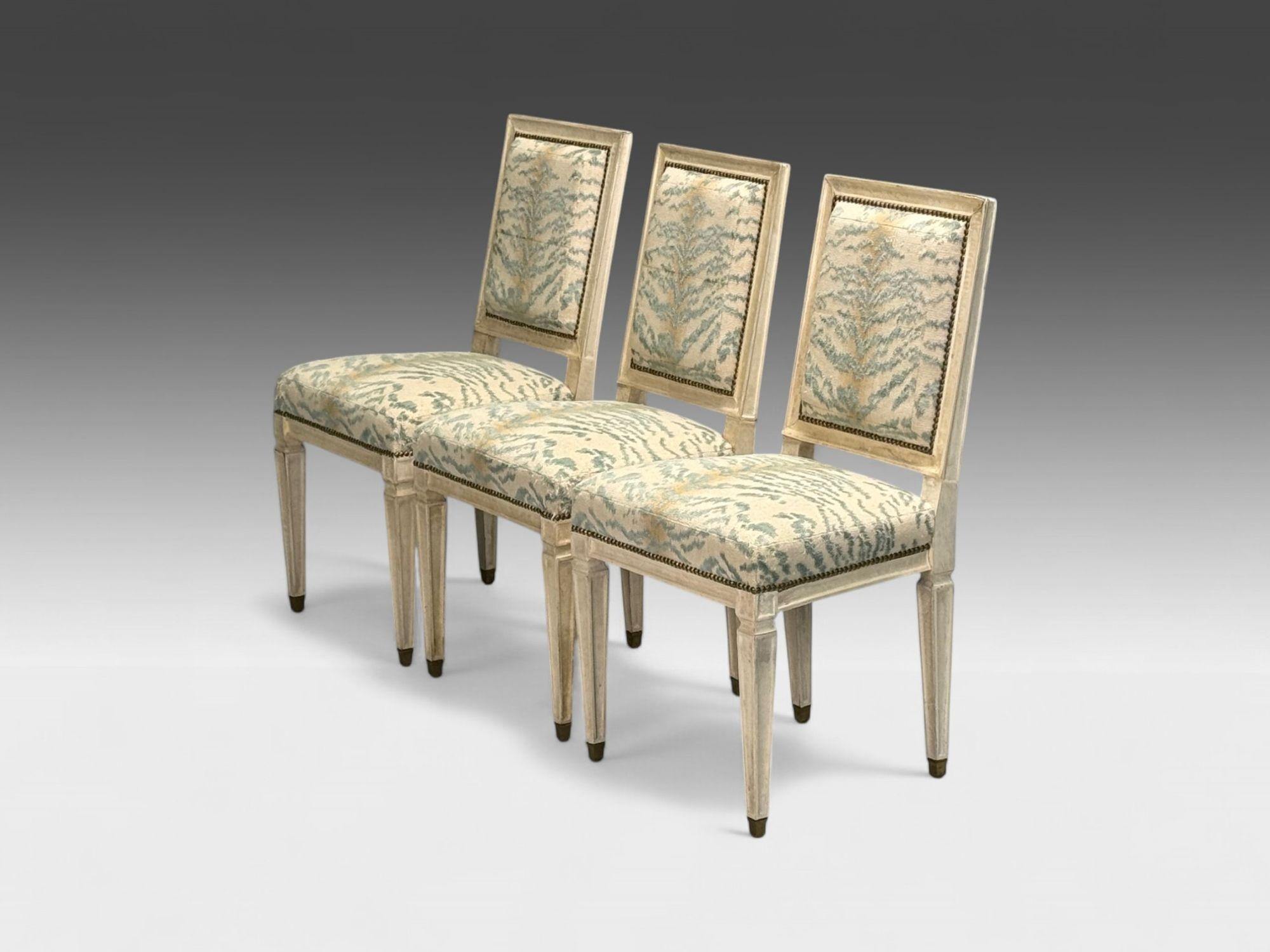 Jean-Michel Frank attr, Louis XVI Style, Six Dining or Side Chairs, Parchment over Wood, Fabric, France c. 1930s

Set of six Directoire style dining or side chairs in parchment clad wood and turquoise/beige animal print fabric. Each example is