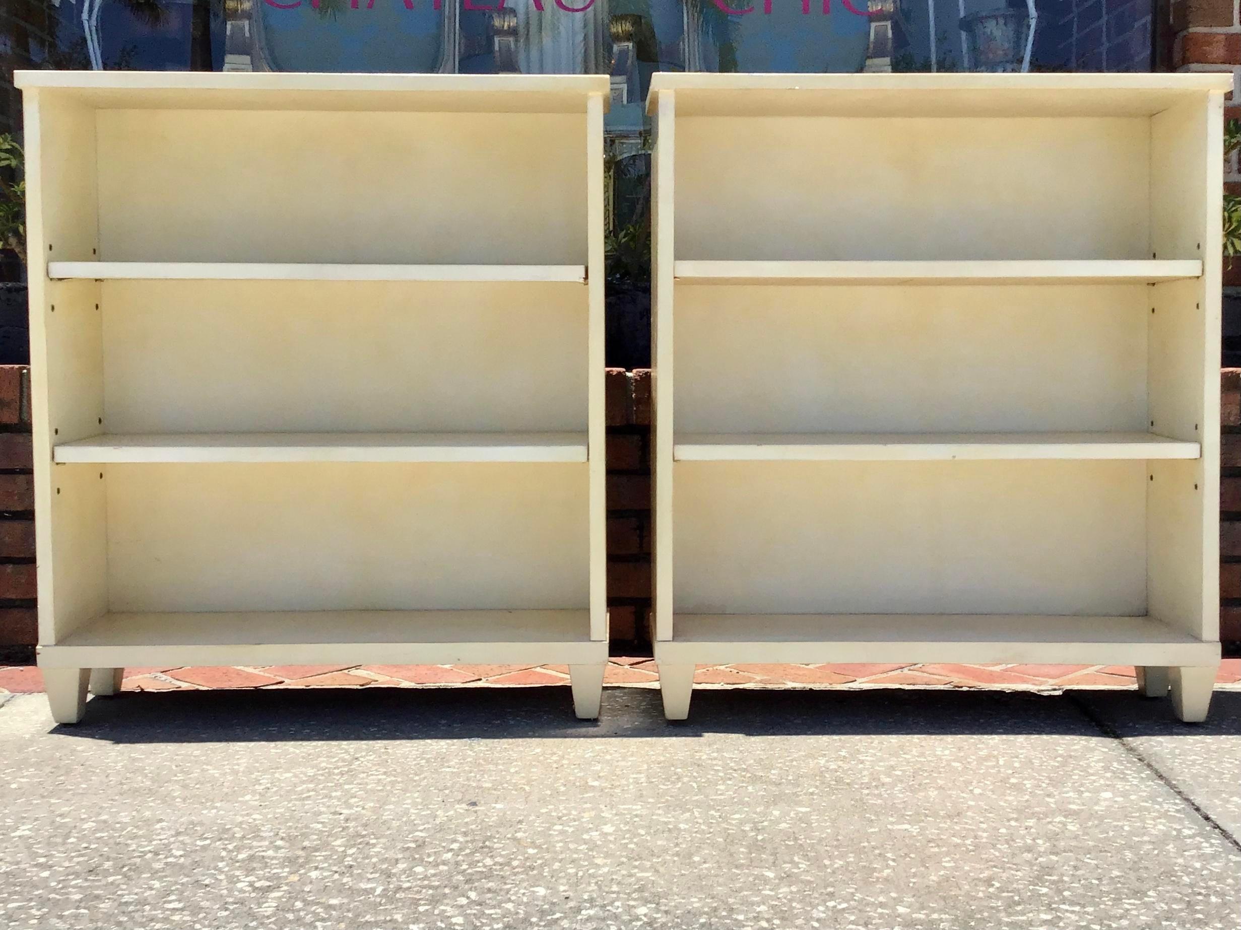 Jean Michel Frank style original bookcase covered in parchment. Classic beauty. And to have an original pair of such beautiful bookcases from Paris with love. Use as bookcases or as display for your special collection. These are in original