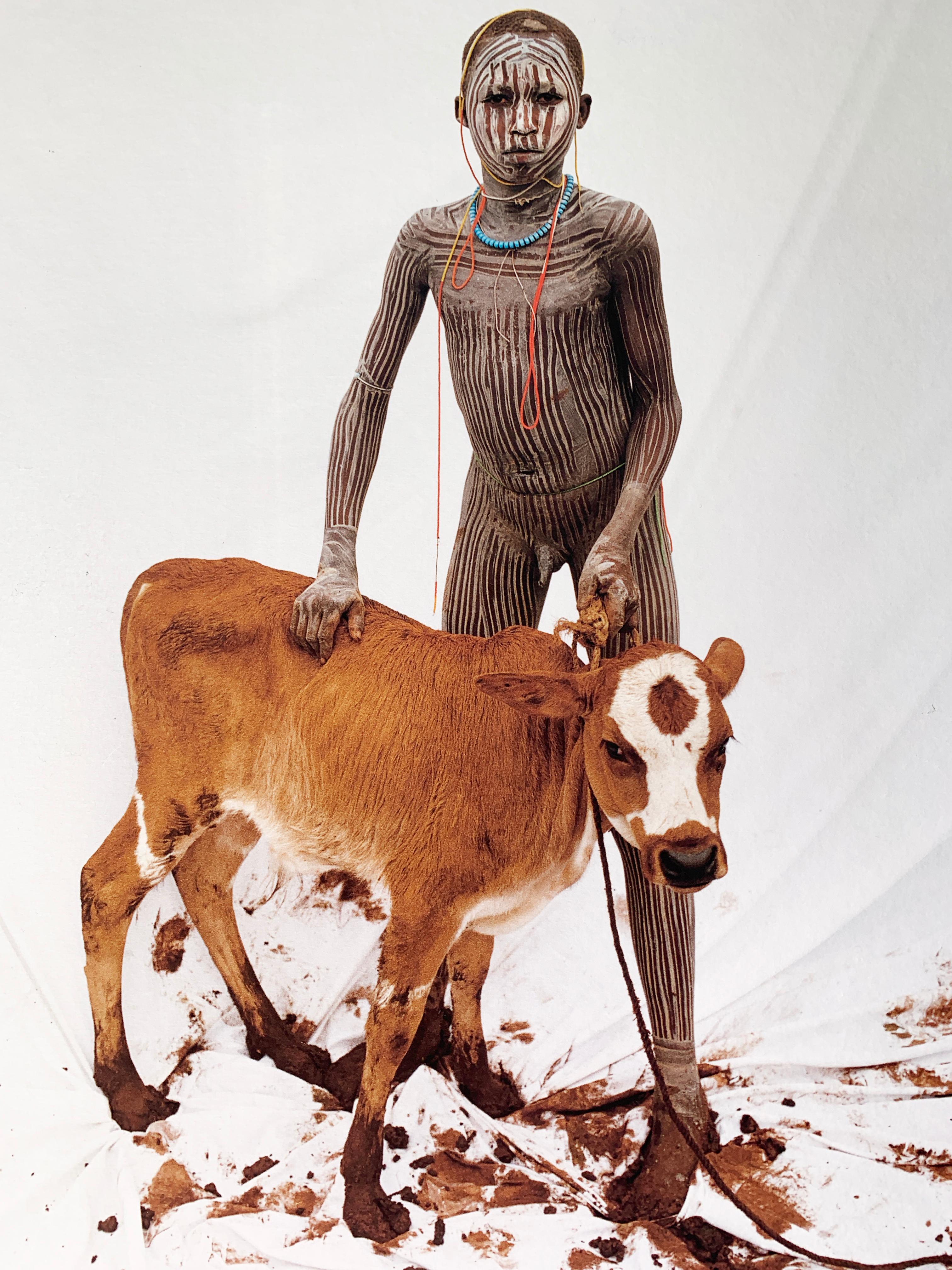 Boy with Calf, Tribal Child in Ethiopia, Africa, Japanese Paper Limited Edition - Photograph by Jean-Michel Voge