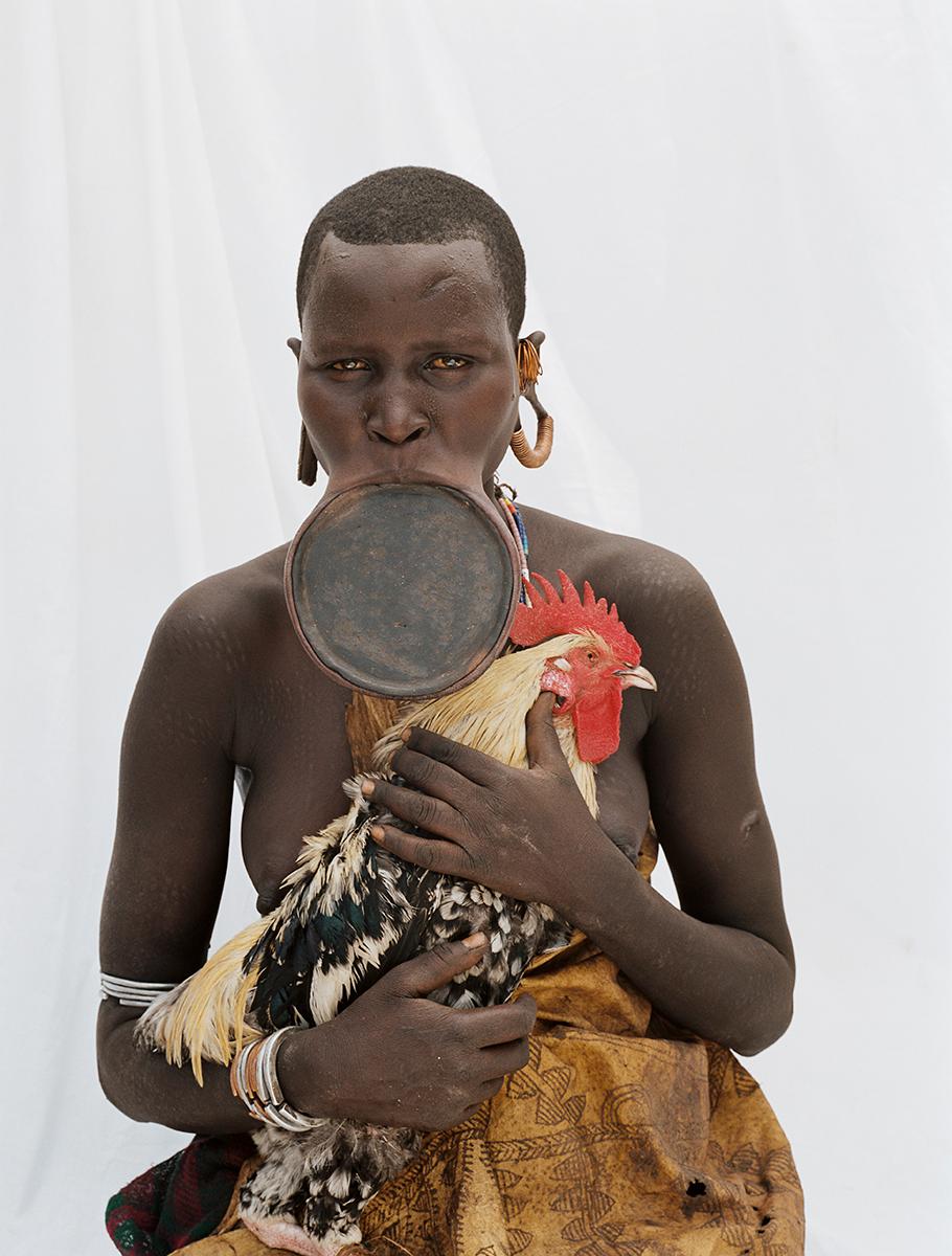 Rooster, Tribal Woman Ethiopia, Africa, Photo on Japanese Paper Limited Edition - Photograph by Jean-Michel Voge