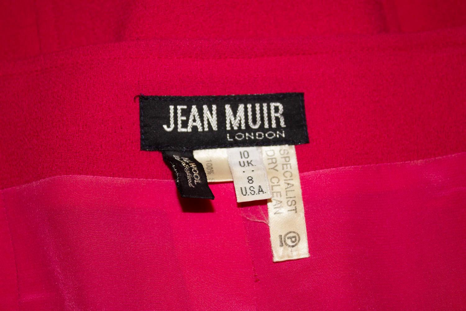 Perfect for Spring, this pretty vintage jacket from jean Muir , the mainline. 
In a pink wool crepe, it has a good collar, two button front opening and tucks under the bust. It is fully lined.
Made in the UK, size 10. measurements;
Bust up to 37'',