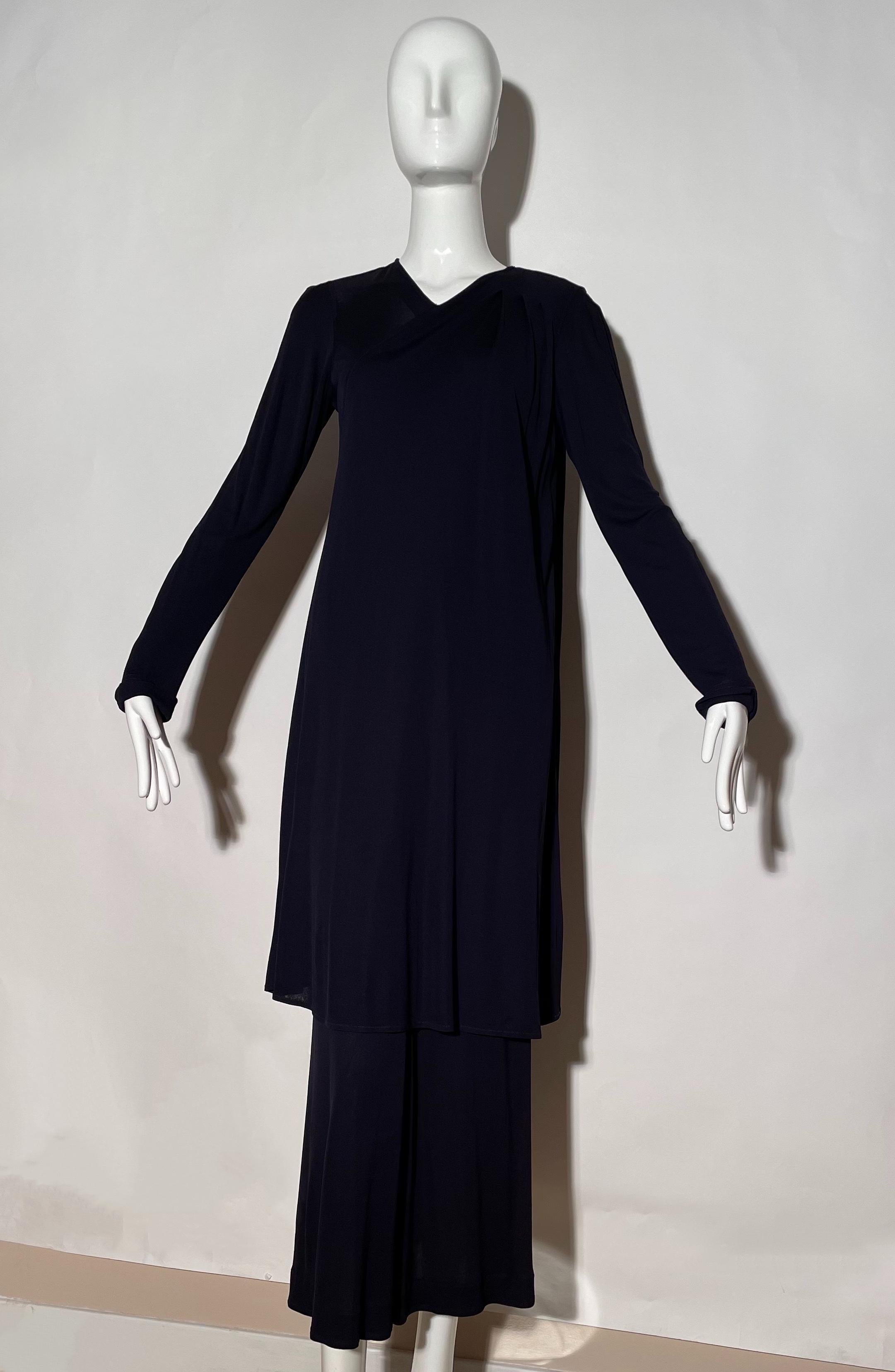 Navy maxi dress. Overlay detail. Longsleeve. Rear button closure. Viscose. Made in England. 
*Condition: great vintage condition. Light discoloration on shoulders ( as pictured ) , unnoticeable.

Measurements Taken Laying Flat (inches)—
Shoulder to