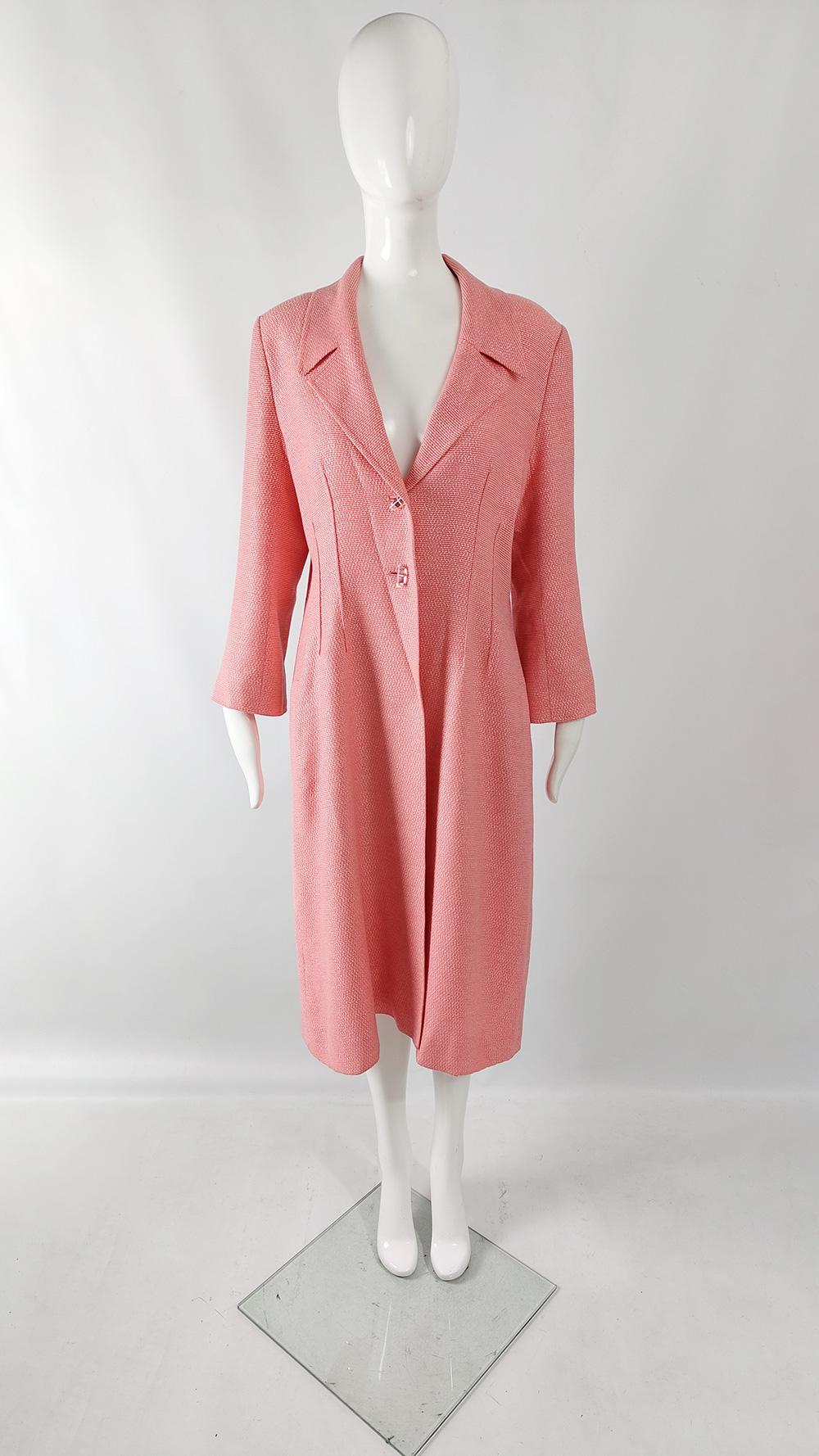 A fantastic vintage womens maxi coat from the 90s by luxury British fashion designer, Jean Muir. Known for her understated, minimalist designs in luxury fabrics that appealed to her sophisticated clientele, including Lauren Baccall, Judi Dench and