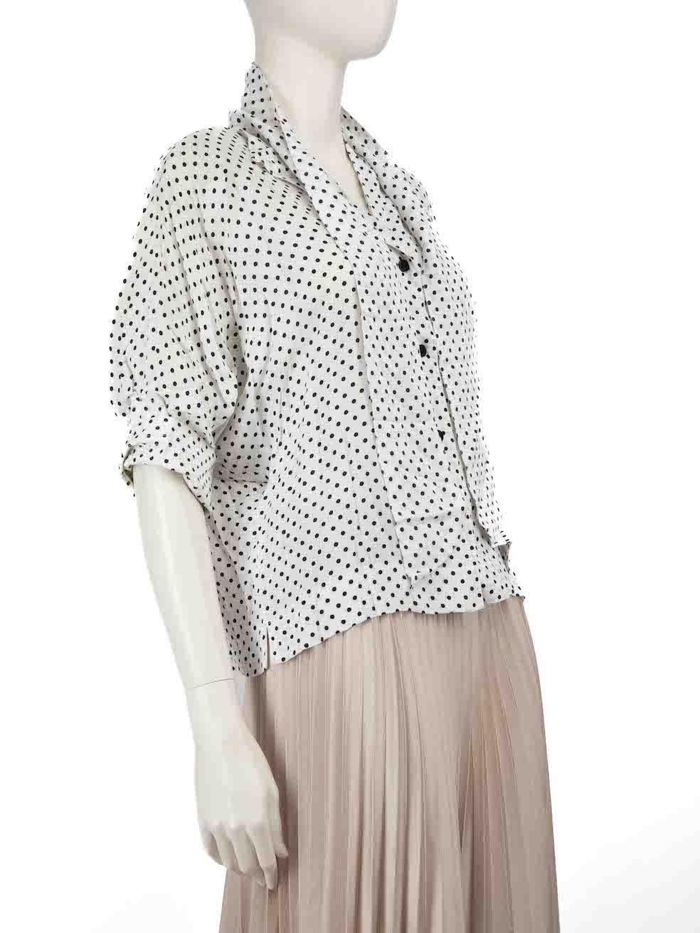 CONDITION is Good. Minor wear to the Top is evident. Light discolouration on both inner cuffs, front second button, collar, shoulder pads, both sleeves and inner button lining on this used Jean Muir designer resale item.
 
 
 
 Details
 
 
 White
 
