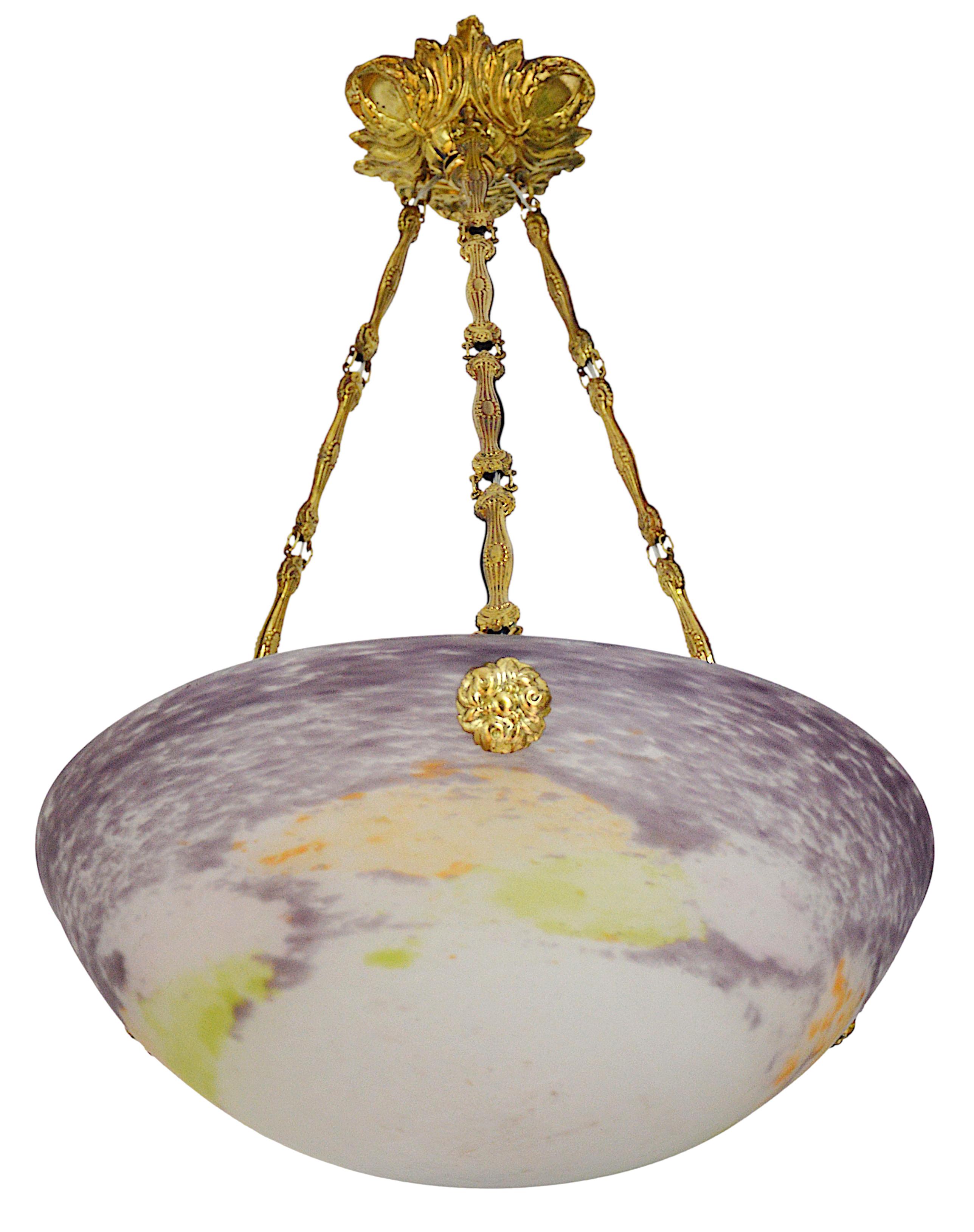 French Art Deco pendant chandelier by Jean Noverdy (Dijon), France, late 1920's. Mottled blown thick double glass shade. Colors : purple, ochre and green. Stamped brass fixture. Height : 20.1