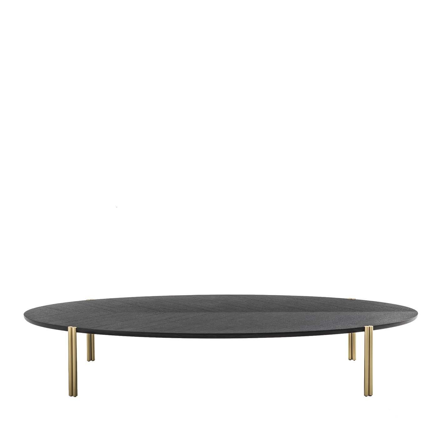 With a sleek and stylish design, the jean ordinary coffee table will perfectly suit any environment, in either a classic or modern style. The legs are available in brass or iron lacquered in a gunmetal gray finish and the top is crafted from wood,