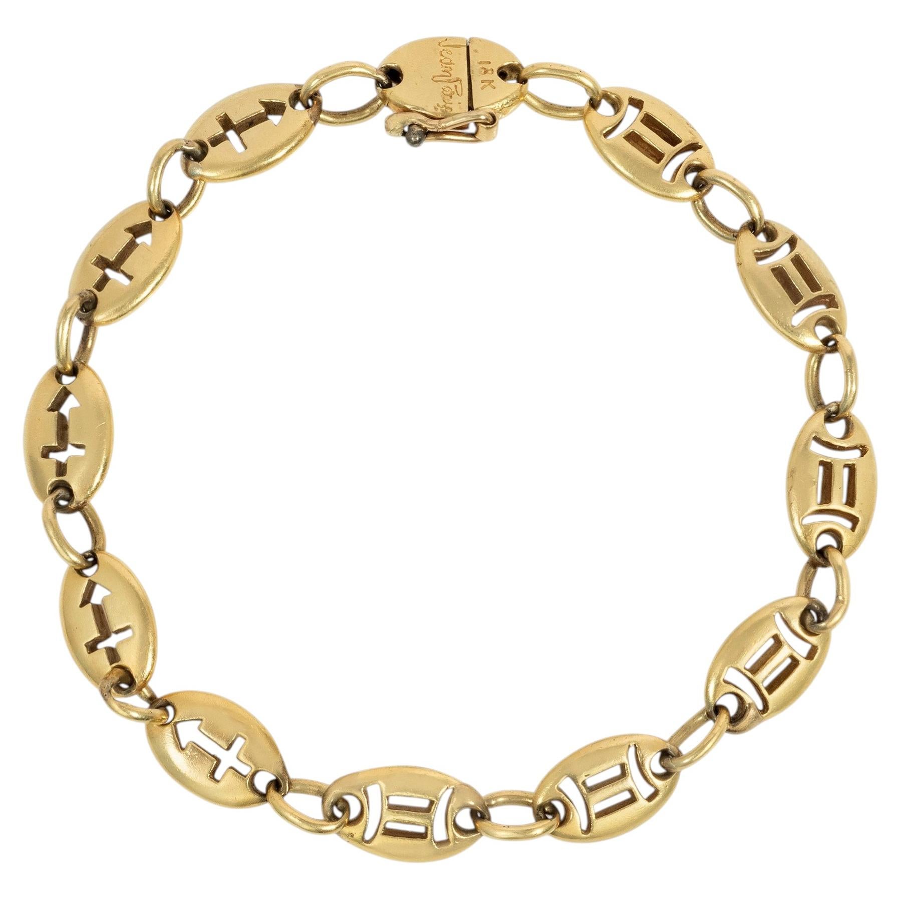 Jean Paris Gemini and Sagittarius gold zodiac bracelet For Sale