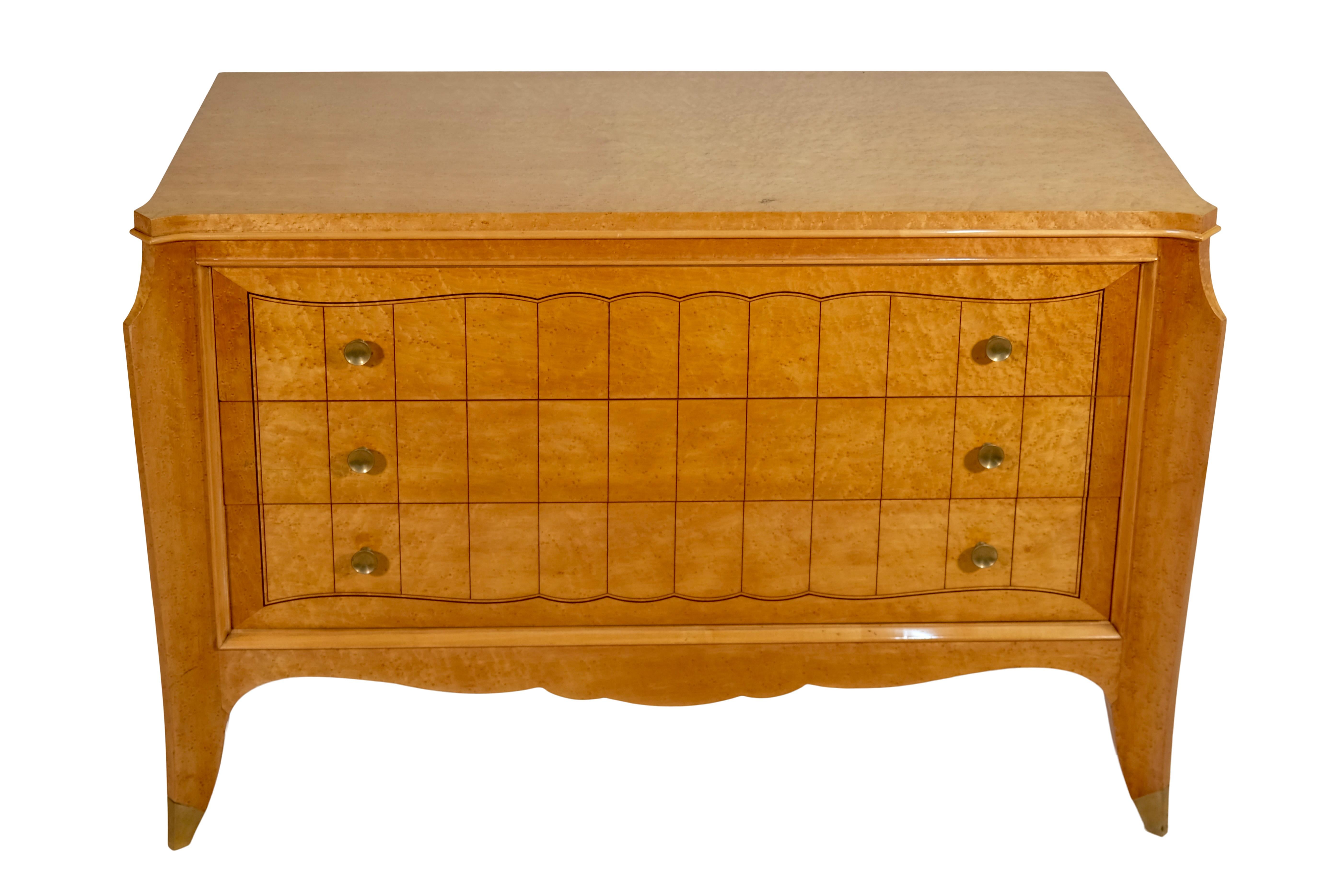 Discover the fascinating Jean Pascaud chest of drawers in bird's eye maple, an outstanding example of the unmistakable formal language and iconic design of this renowned artist. With its clean lines, geometric ornaments, and elegant proportions,