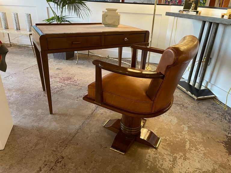 Jean Pascaud (1903 - 1996)

Original Cherry wood desk from the Cite Universitaire of Paris with two drawers.
Refinished, top newly covered with suede. Two drawers, one can be locked with one key.

Jean Pascaud used to design the NORMANDIE Liner, the