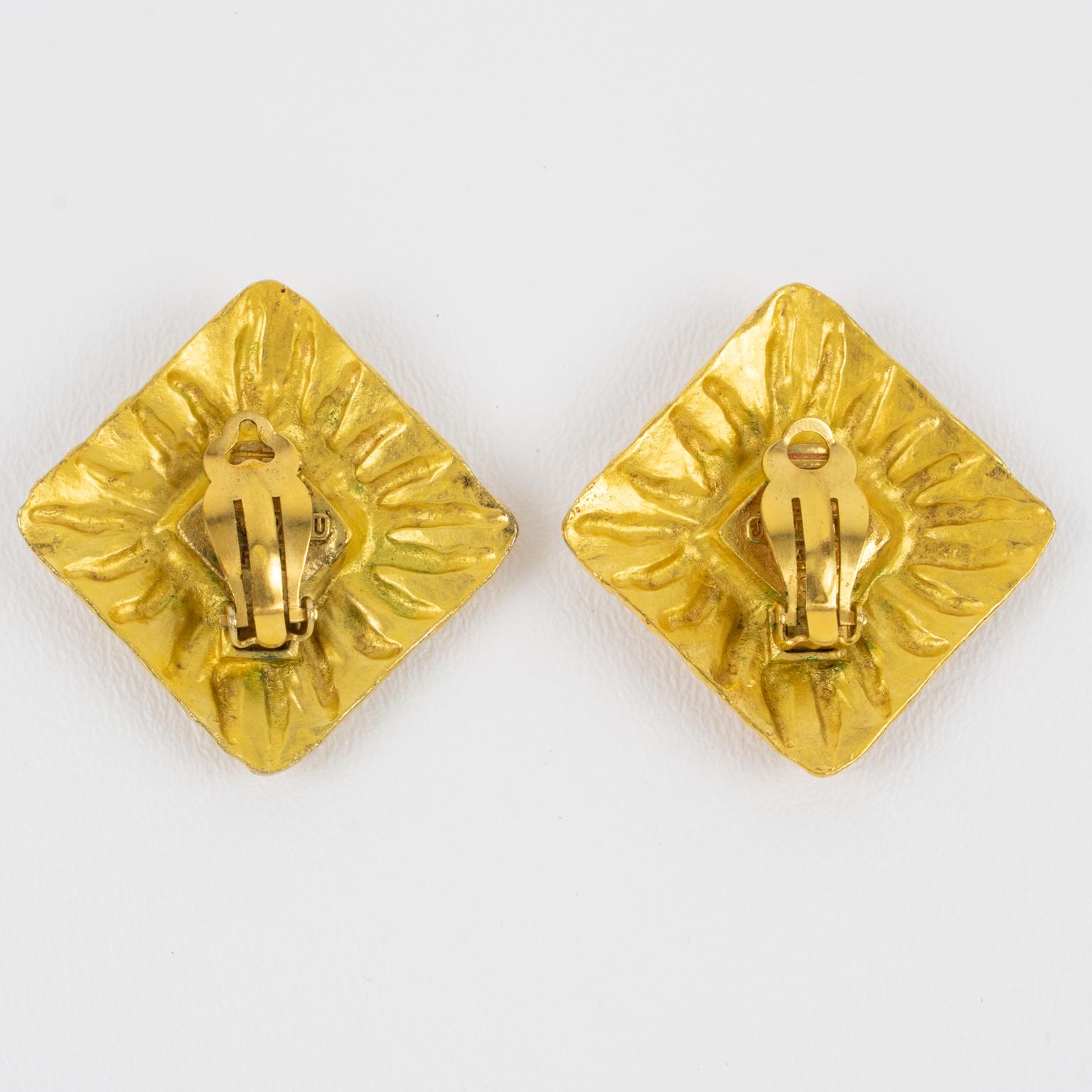 Modern Jean Patou Paris Gilt Metal Sun Clip Earrings with Yellow Poured Glass Cabochon For Sale