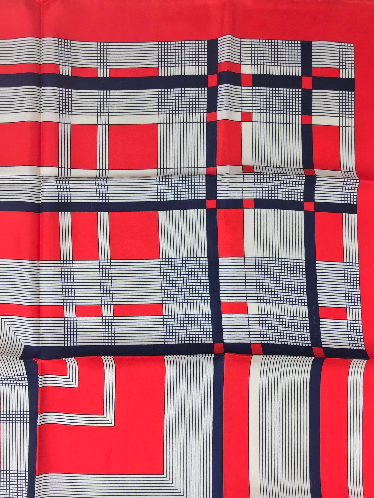 Jean Patou red white and blue geometric silk scarf from the 1970s. Graphic and bold. Hand rolled hems. 30 1/2