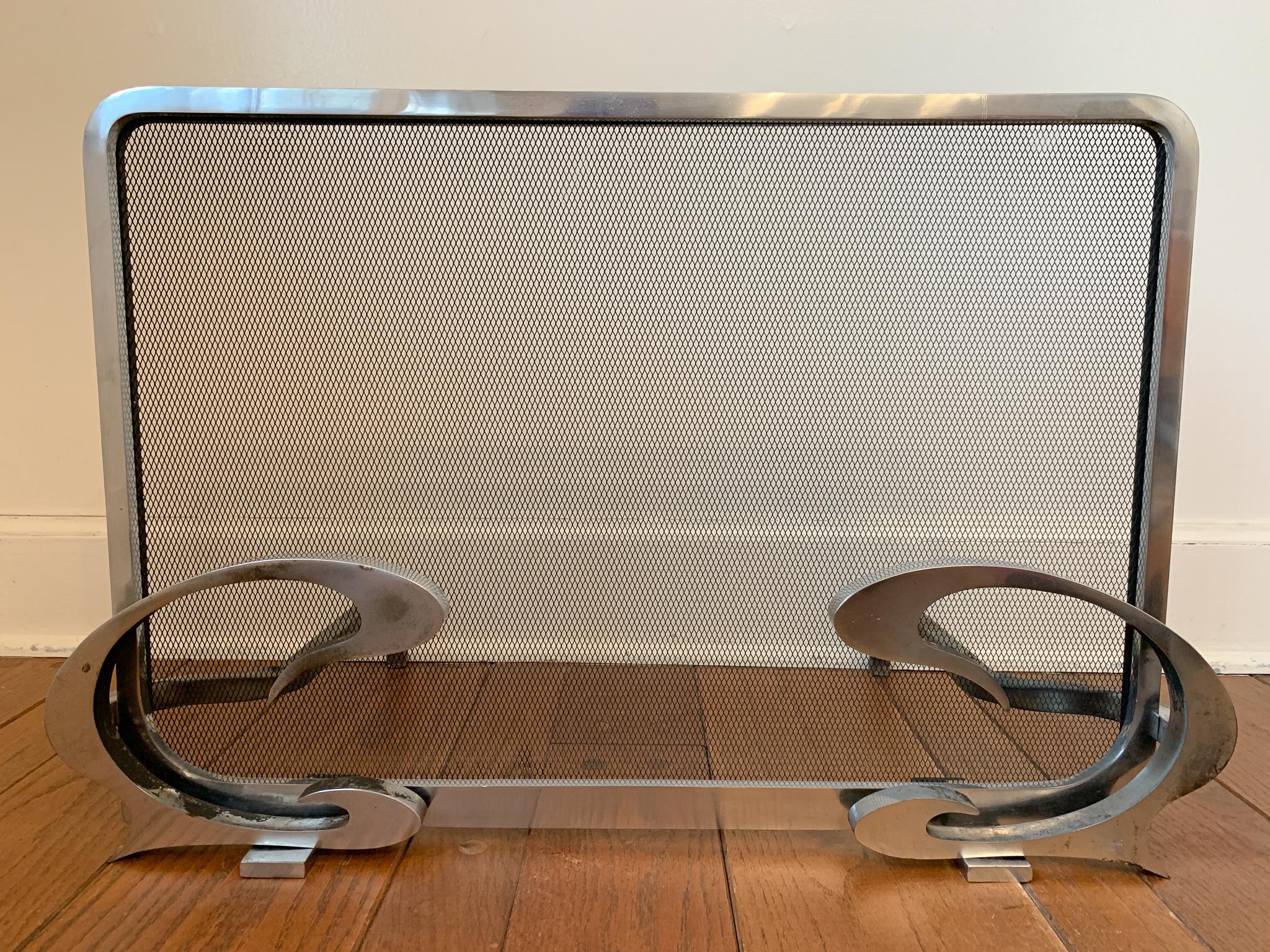 For your consideration is this rarely seen complete fireplace set in stainless steel designed by Jacques Charles and manufactured by Jean-Paul Créations, France, Circa 1970's. Minimalist, yet Art Nouveau styled, this well-made and lightly used set