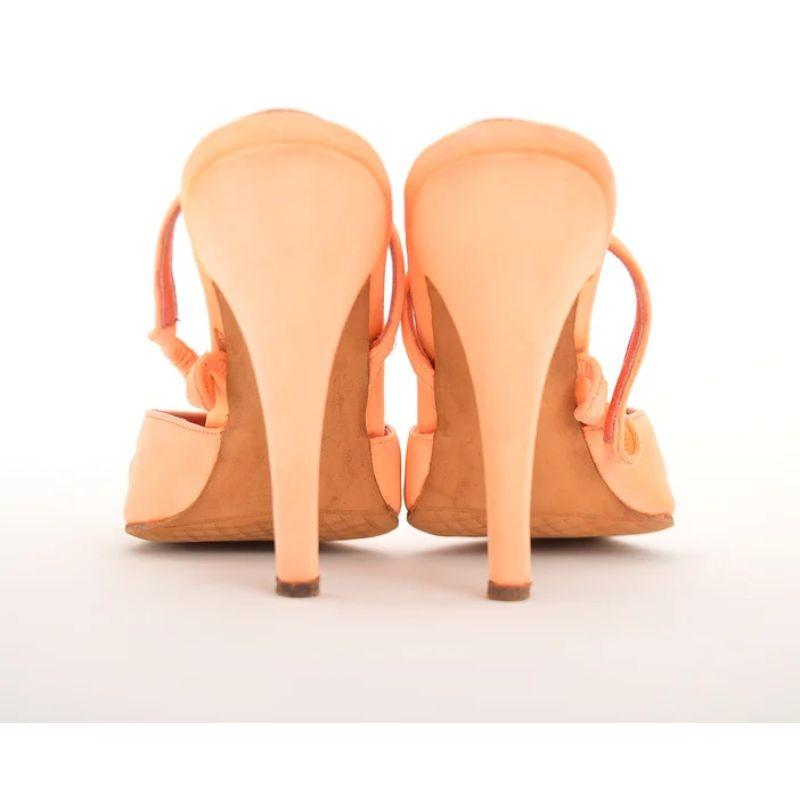 Superb, Vintage Bespoke JEAN PAUL GAULTIER neon orange heels (Circa 1980) produced by Massaro Paris bespoke Shoemakers, presumeably for one of Gaultiers Very early Runway shows. 

Features:
Leather lined insole
Neon orange outer
Leather