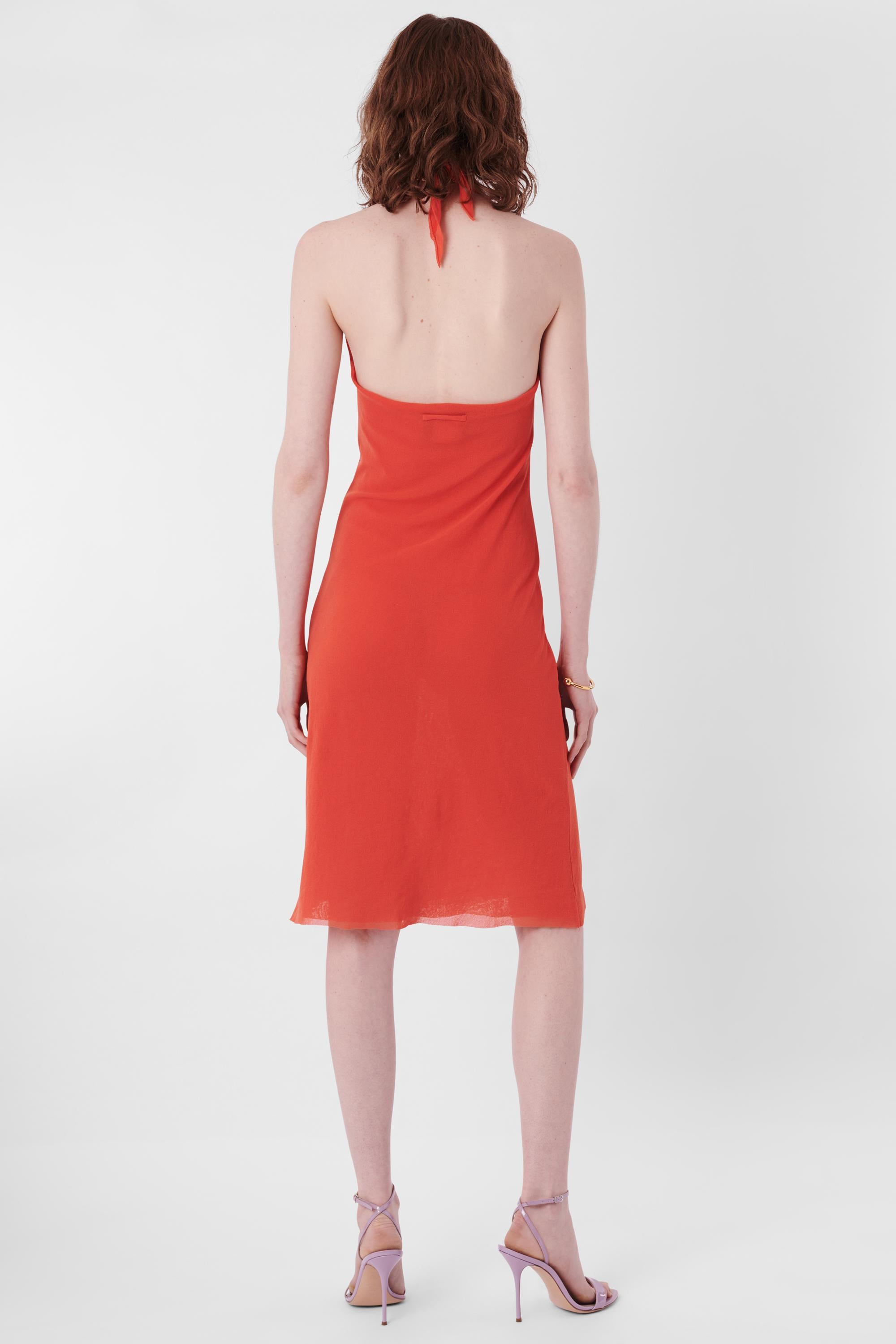 Vintage Jean Paul Gaultier 2000's Coral Halter Neck Mesh Dress. Features Halter neck design, straight fit in midi length. In excellent vintage condition.

Label size: Small
Modern size: UK: 8 to 10, US: 2 to 4, EU: 36 to 38
Measurements when laid
