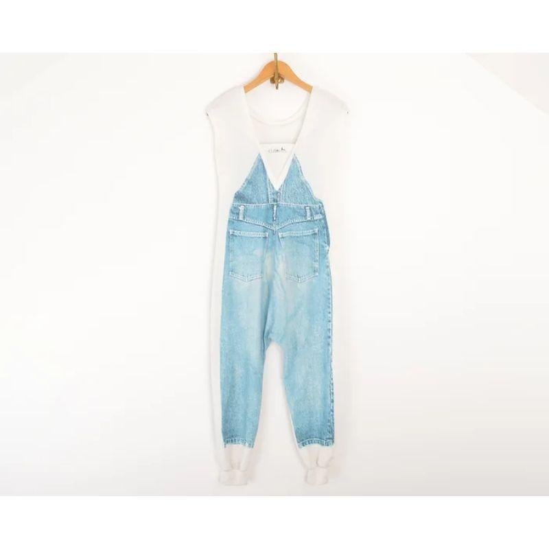 Super fun JEAN PAUL GAULTIER jumpsuit, with Trompe-l'œil dungaree print on both front and back.

Features:
Trompe-l'œil Overalls Print
Rounded neckline with plunged V-back
Cuffed ankles
Loose fitting shape

97% Polyester / 3% Elastane

Designed in