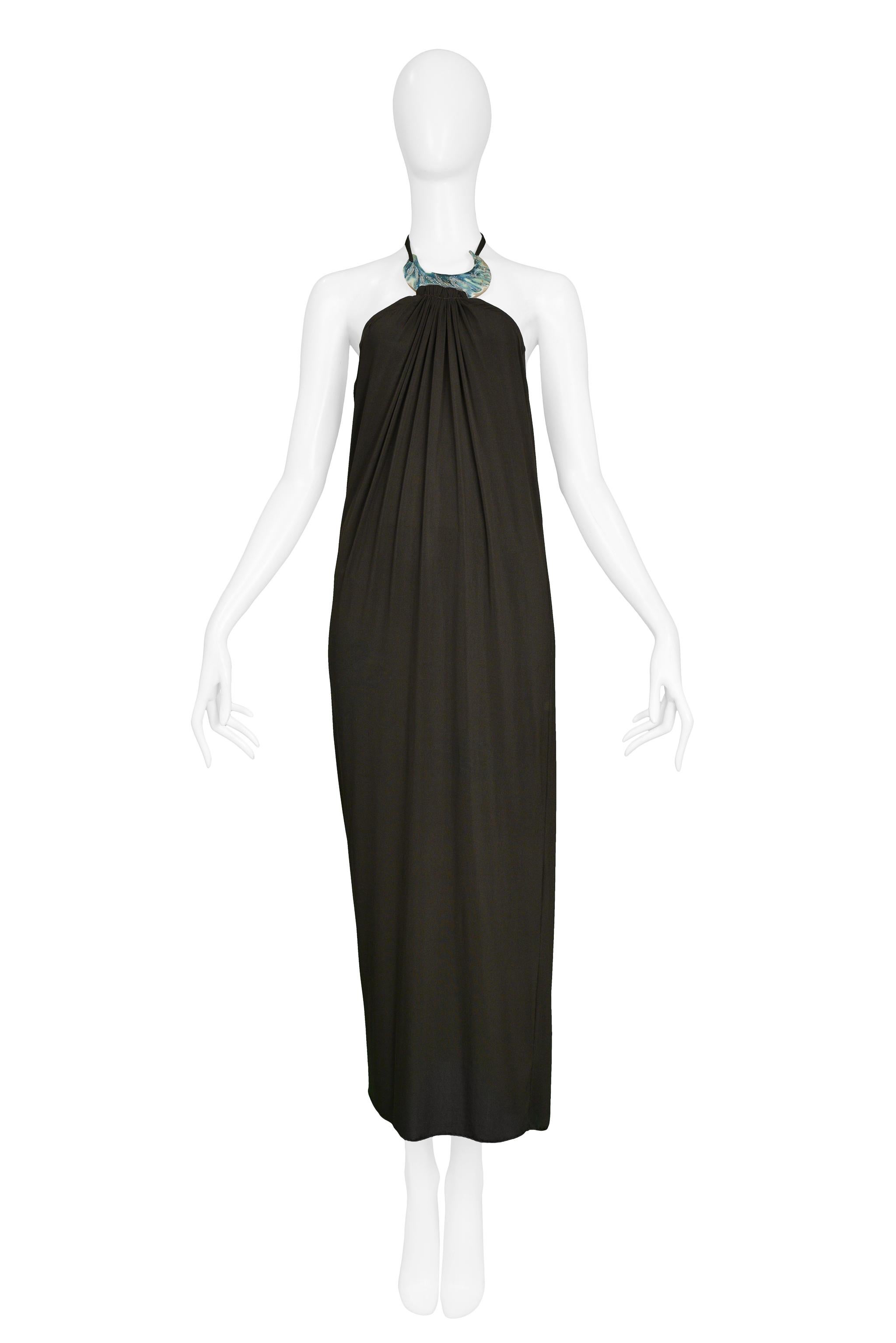 Resurrection Vintage is excited to offer a vintage Jean Paul Gaultier olive green silk jersey wrap gown featuring an abalone collar that ties at neck, open back & matching bikini bottoms. Spring / Summer 2000 Collection.

Jean Paul Gaultier
Size