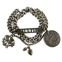 JEAN PAUL GAULTIER Antiqued Silver Toned Curb Chain Charm Bracelet