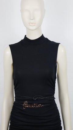 Ceinture fine Jean-Paul Gaultier ( attribuée à) logo incurvé de couleur cuivre