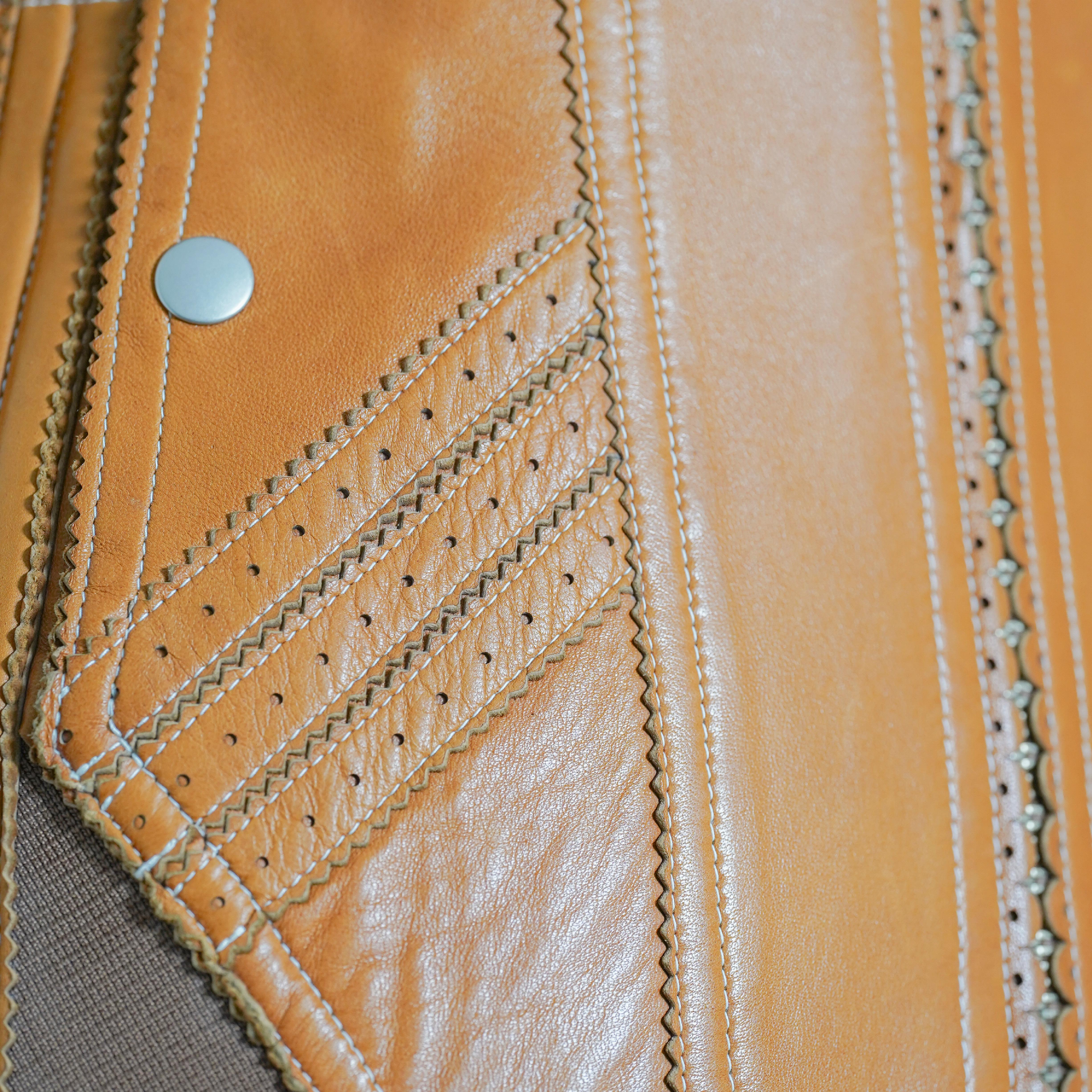 Beige Jean Paul Gaultier - Veste en cuir perforé beige, S/S 2004 en vente