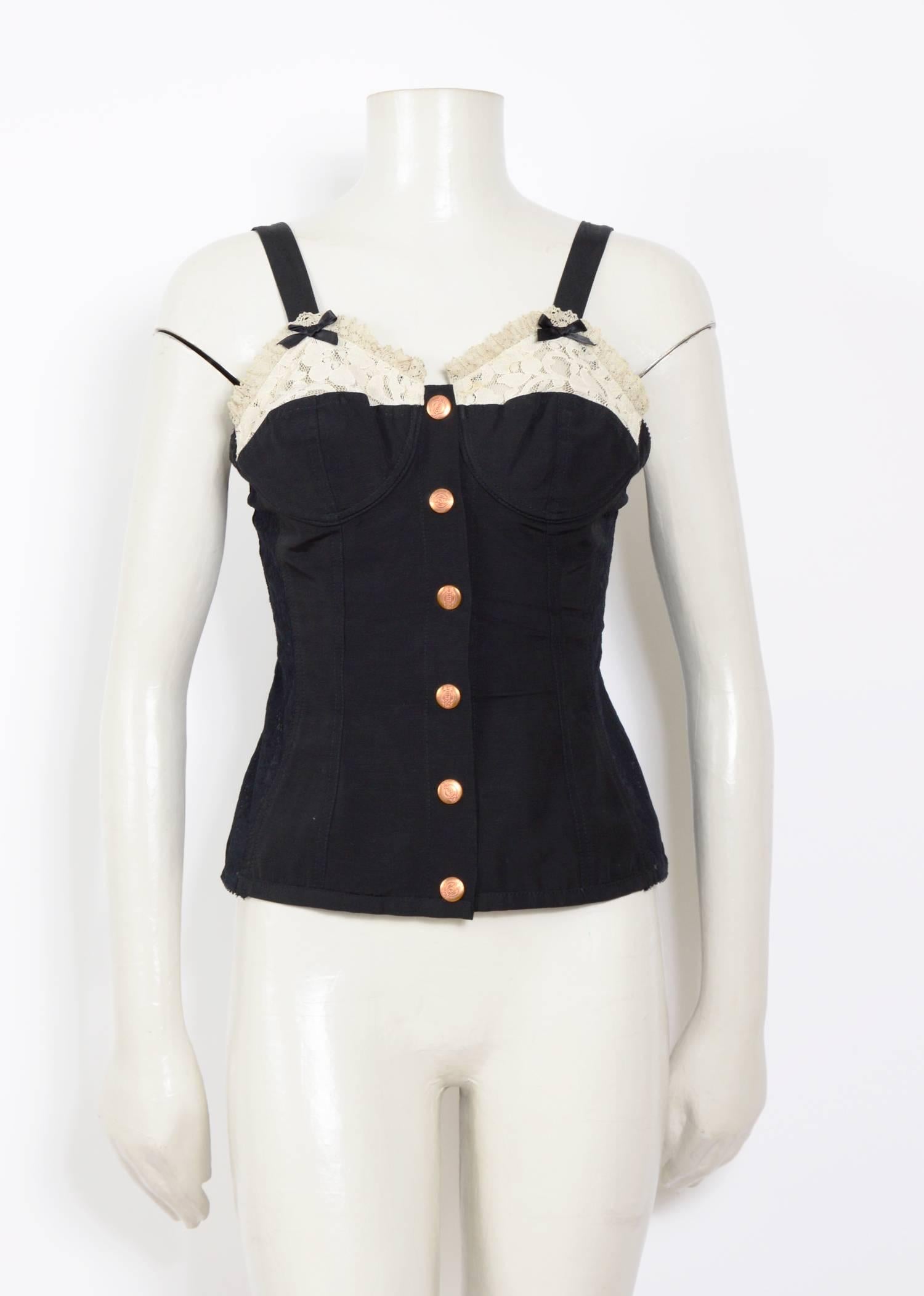 Jean Paul Gaultier black corset top.
60% cotton and 40% rayon.
Lace elasticized panels allowing side stretch, front button closure.
There is no Size Label, please use the measurements that are taken flat?
Ua to Ua 16,5inch/42cm(x2) - Waist