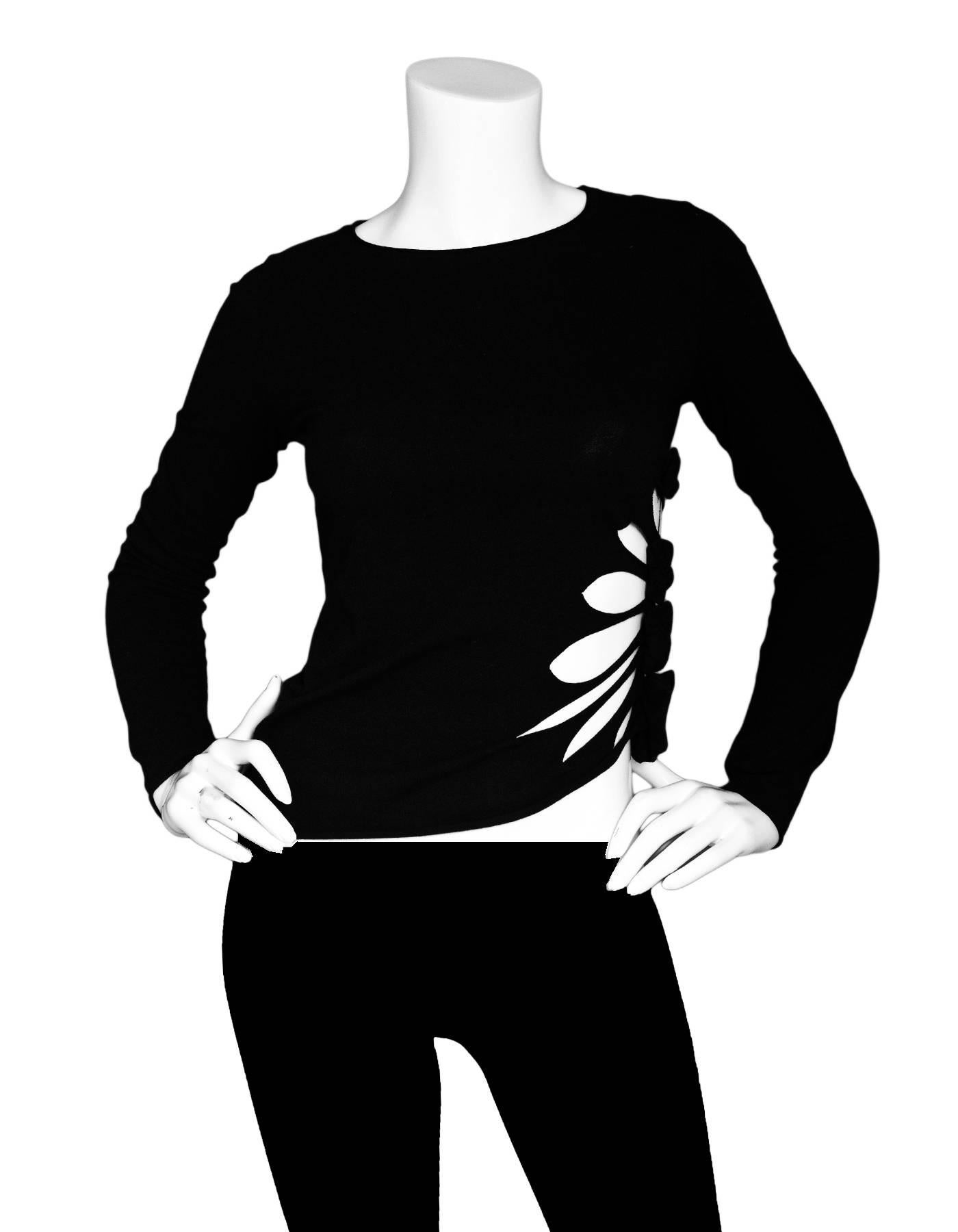 Jean Paul Gaultier Black Cut-Out Top Sz S

Made In: Italy
Color: Black
Composition: 90% cotton, 10% lycra
Lining: None
Closure/Opening: Pull over
Exterior Pockets: None
Interior  Pockets: None
Overall Condition: Excellent pre-owned condition
Marked