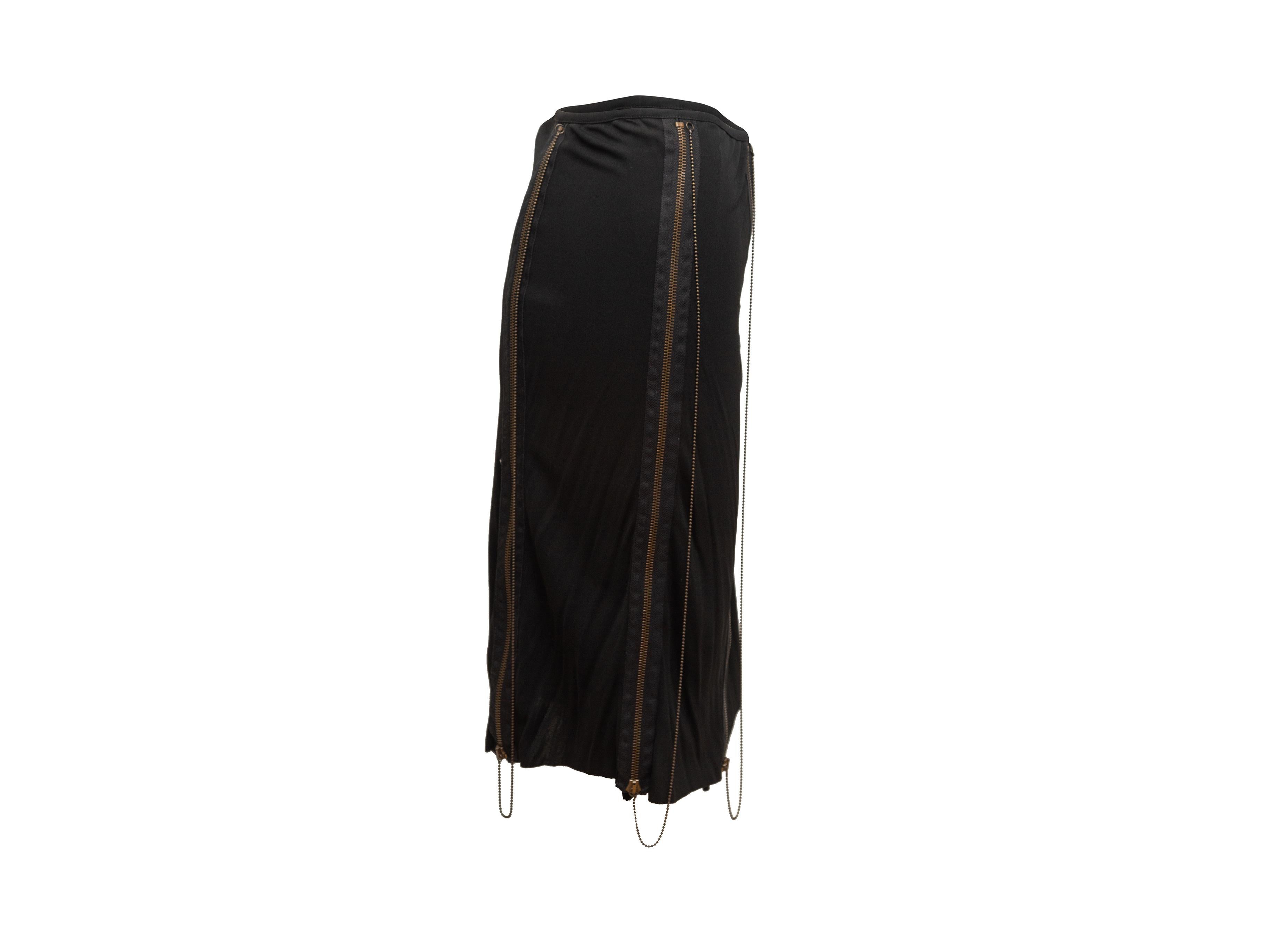 Product details: Vintage black skirt by Jean Paul Gaultier Femme. Bronze exposed zipper detailing throughout. 35