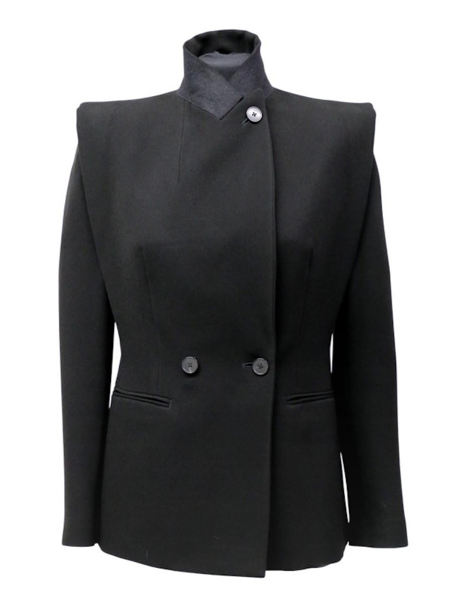 Double-breasted jacket by Jean Paul Gaultier that can be worn open or closed, with a stand-up or classic collar, thanks to three dark brown buttons. The jacket is structured with two shoulder pads. Felt details under the collar, two decorative