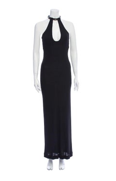 Jean Paul Gaultier black jersey gown with leather choker collar.
