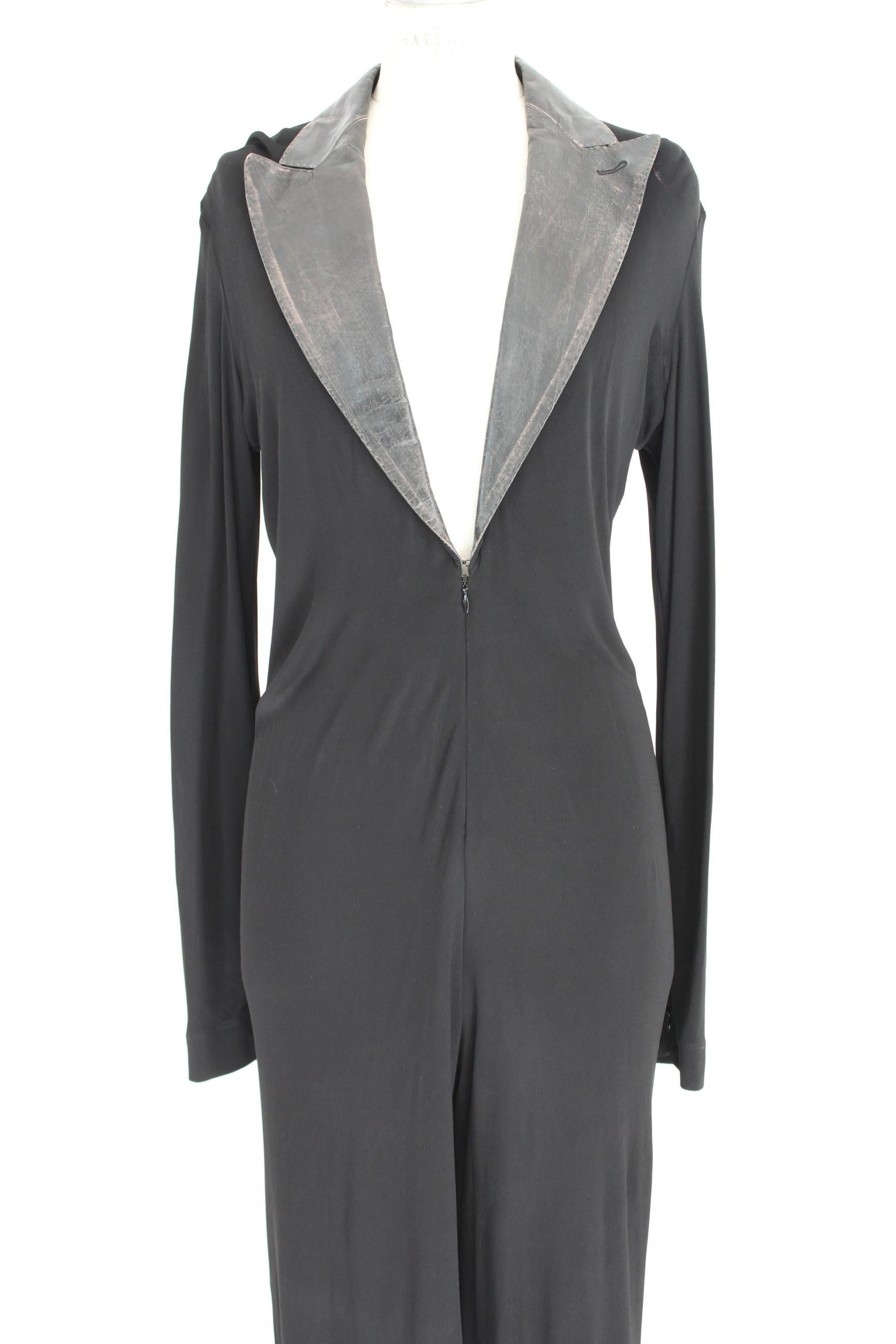 Jean Paul Gaultier elegant jumpsuit in soft rayon. Neck with leather reverse. Sensual neckline along the chest with zip closure. The jumpsuit has a soft fit. This jumpsuit is suitable for formal events such as gala dinners, elegant evenings and