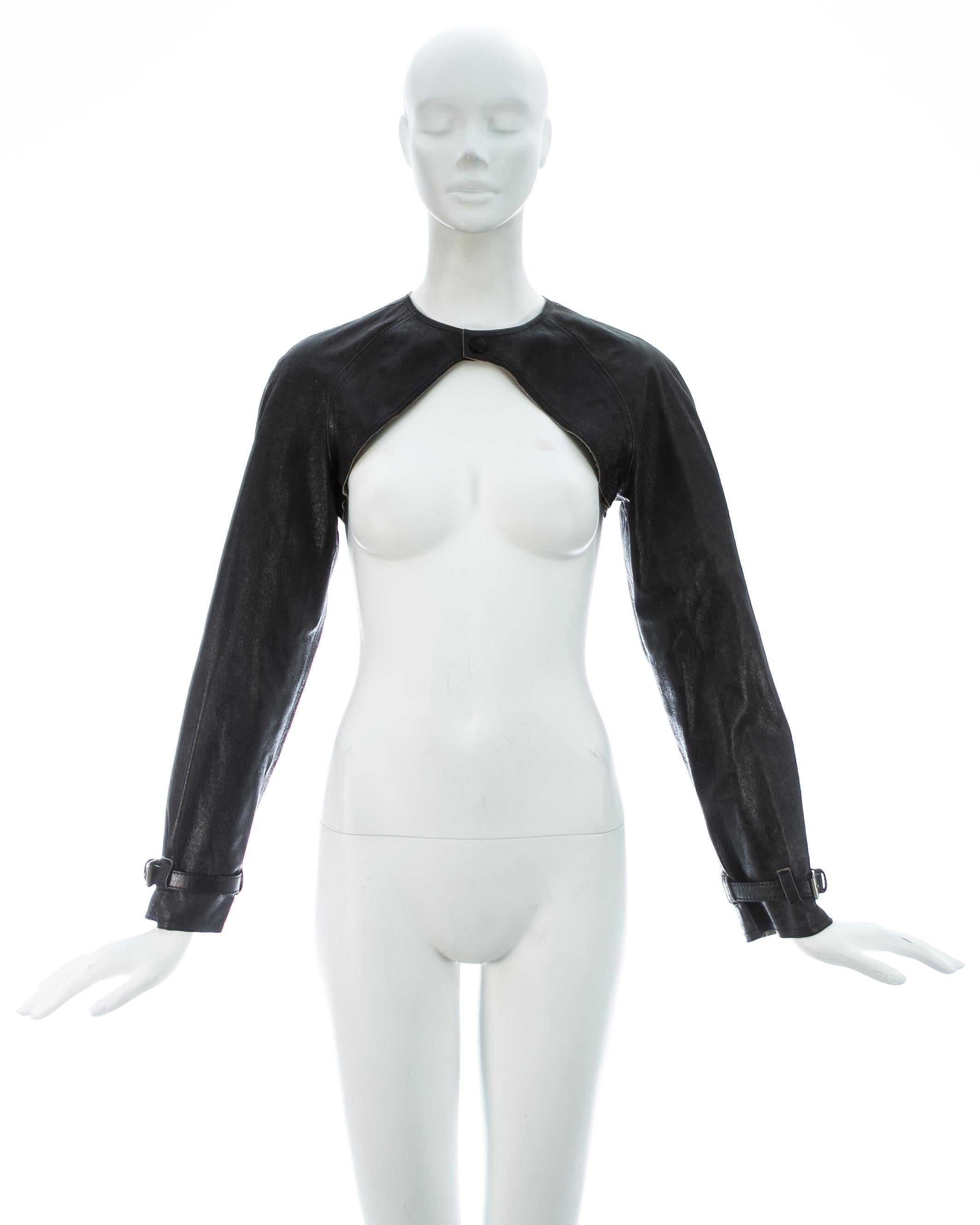 Jean Paul Gaultier black leather raglan sleeve cropped jacket with snap button and buckle closures 

Spring-Summer 2001
