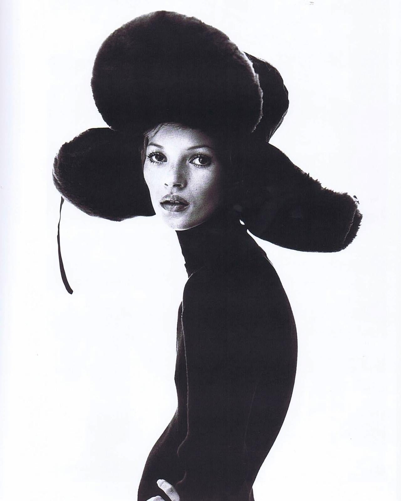 Jean Paul Gaultier black puffer trapper hat. Oversized proportions, metal buckle fastening and padding throughout.

Fall-Winter 1993