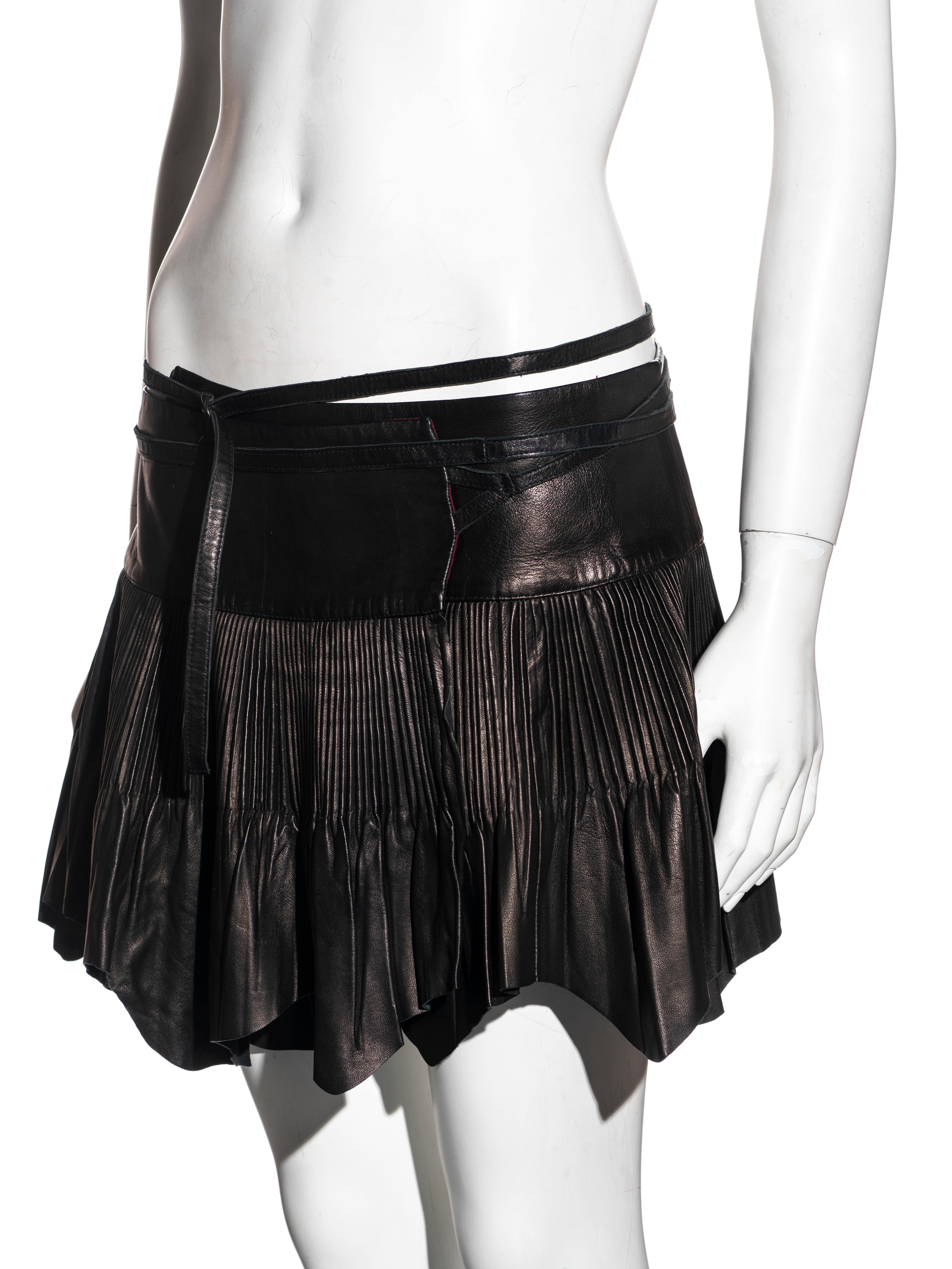 Black Jean Paul Gaultier black pleated leather mini wrap skirt, fw 2003