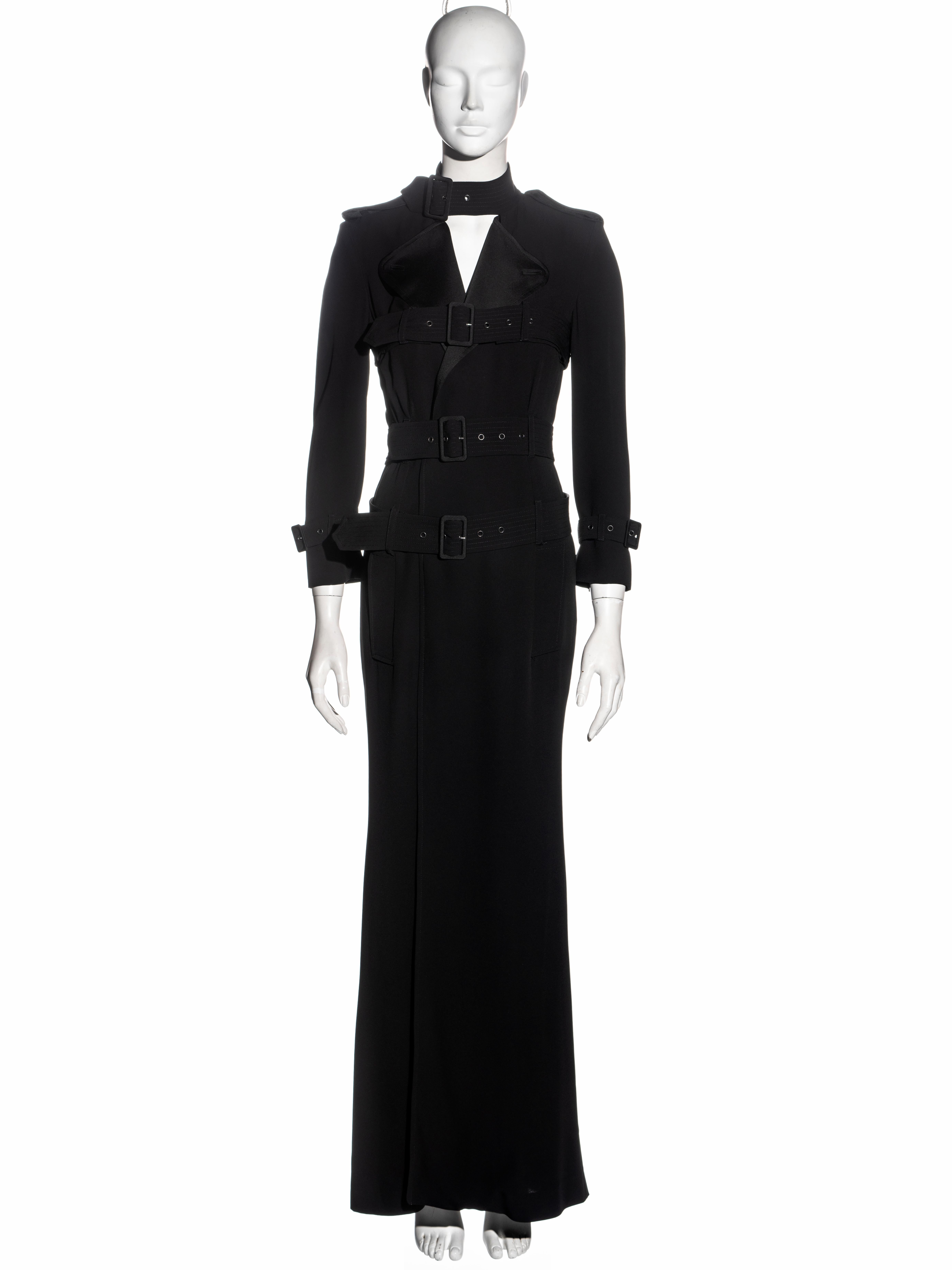 ▪ Jean Paul Gaultier shirt dress
▪ Black Rayon and Acetate blend 
▪ Four attached bondage belts at the hips, waist, bust and neck
▪ Floor-length skirt 
▪ IT 38 - FR 34 - UK 6 - US 4
▪ Fall-Winter 2009
▪ 58% Rayon 42% Acetate
▪ Made in Italy