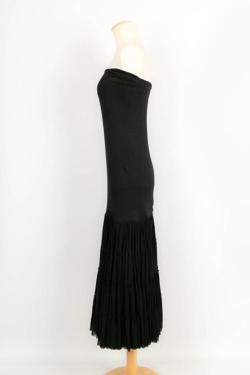Jean Paul Gaultier -(Made in Italy) Black strapless dress. Size L, it fits a 38FR.

Additional information: 
Dimensions: Length: 115 cm
Condition: Very good condition
Seller Ref number: VR142
