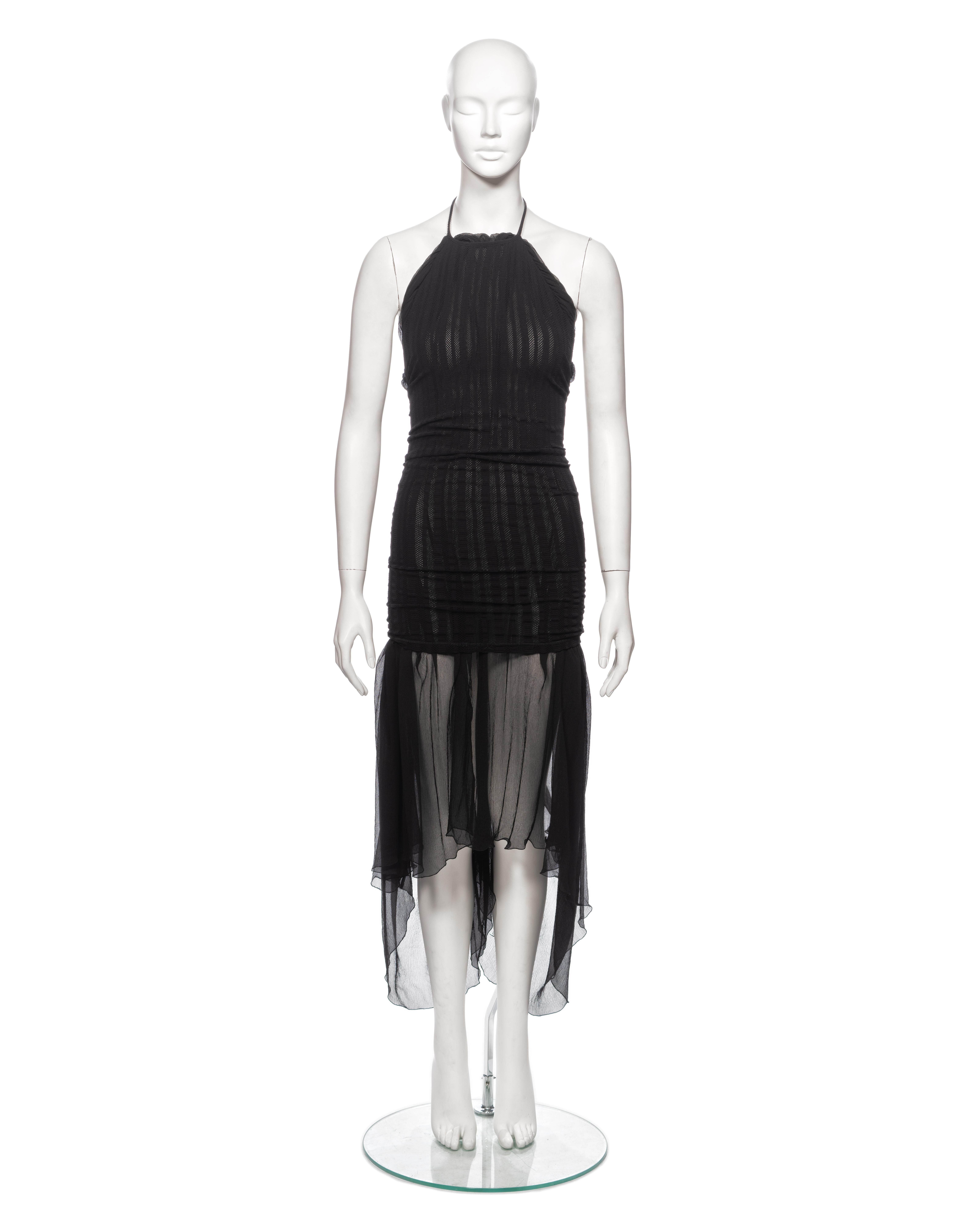 ▪ Brand: Jean Paul Gaultier
▪ Creative Director: Jean Paul Gaultier
▪ Collection: Spring-Summer 2001
▪ Fabric: Black Silk Chiffon, Synthetic Stretch Mesh
▪ Details: Halter-neck, silk chiffon underlay allows for multiple styling options, five string