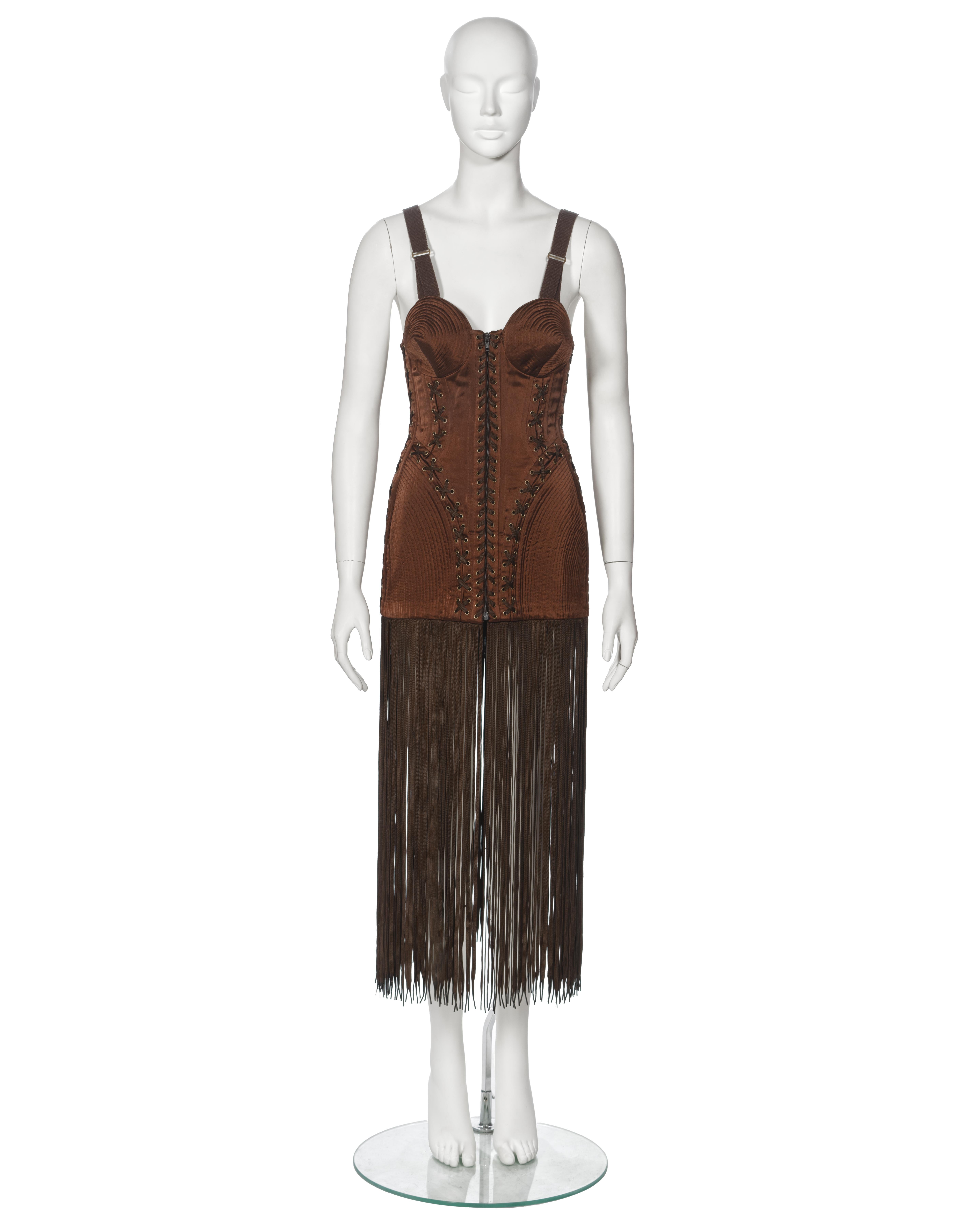 ▪ Archival Jean Paul Gaultier Corset Dress
▪ Fall-Winter 1990
▪ Sold by One of a Kind Archive
▪ Museum Grade
▪ Constructed from chestnut brown satin 
▪ Conically embroidered breast cups
▪ Quilted top-stitched hip panels
▪ Criss-cross laced corsetry