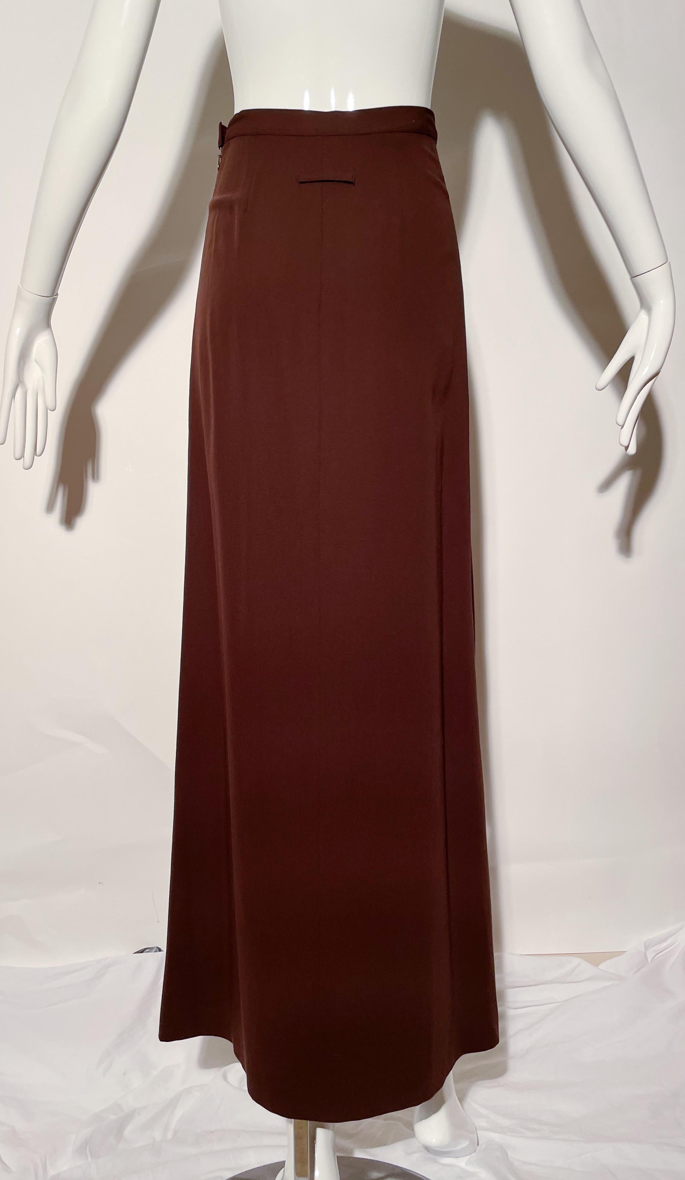 Chocolate brown maxi skirt. Side zipper. Wool. Made in Italy. 

*Condition: Excellent vintage condition. No visible flaws.

Measurements Taken Laying Flat (inches)—
Waist:  24 in.
Hip: 30 in.
Length: 41 in.
Marked size: 38 IT, 4 US, best fit for a