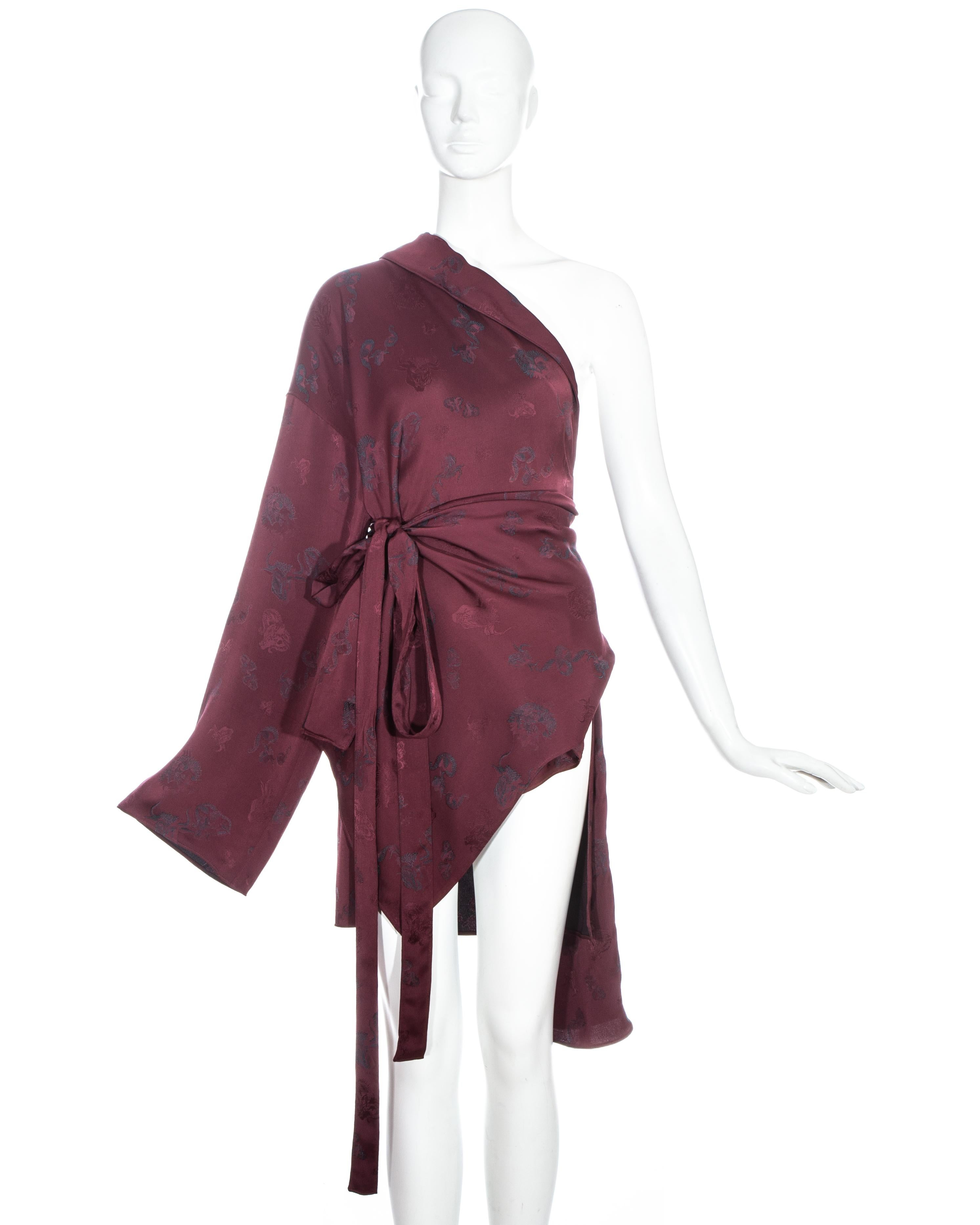 Jean Paul Gaultier burgundy rayon jacquard oversized kimono style wrap jacket - originally styled on the runway with one sleeve worn but can be worn in multiple ways.

Fall-Winter 1994